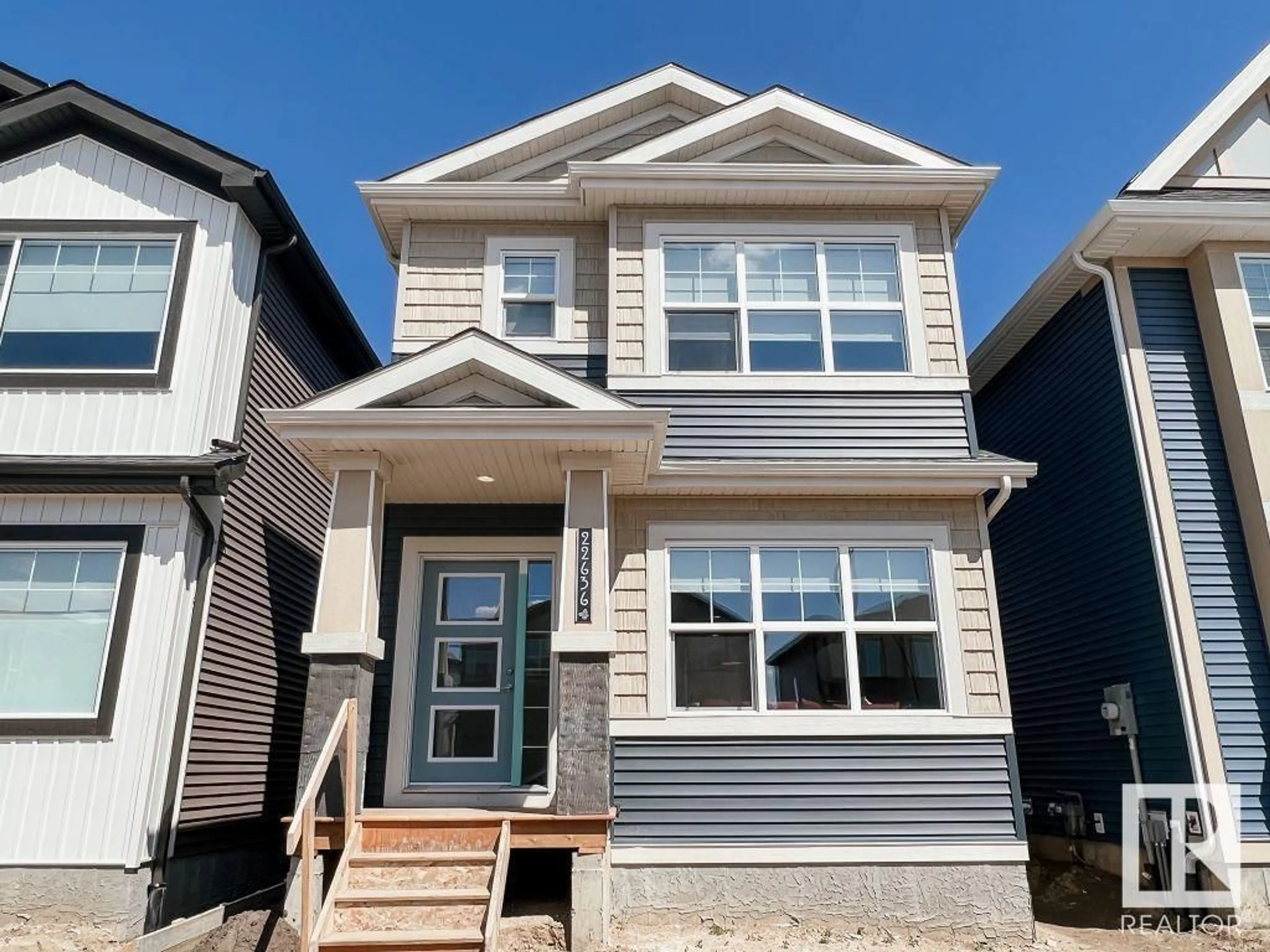 Home with vinyl exterior material, street for 124 GARNEAU GA, Spruce Grove Alberta T7X0M6