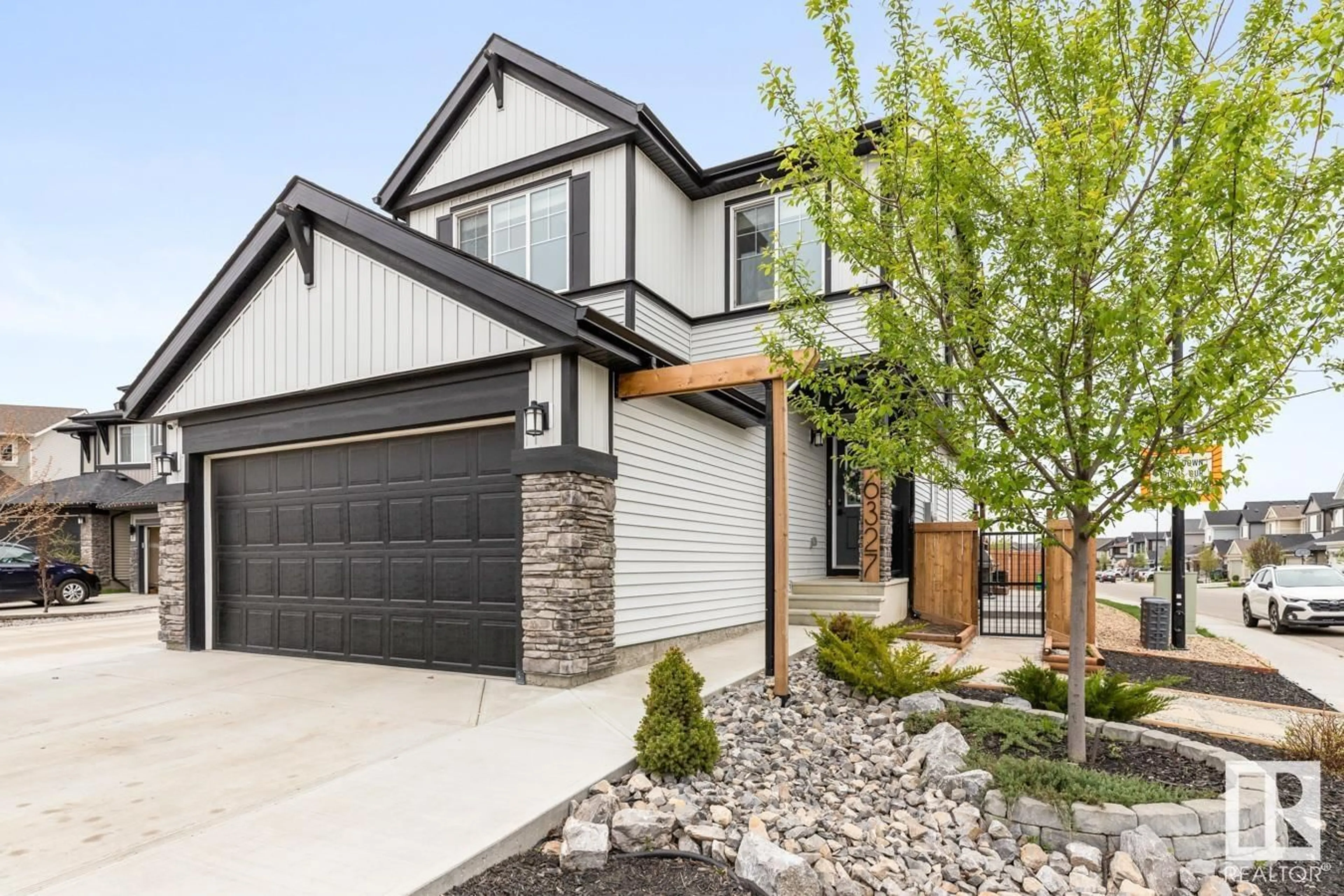 Home with brick exterior material, street for 6327 173 AV, Edmonton Alberta T5Y3Y3
