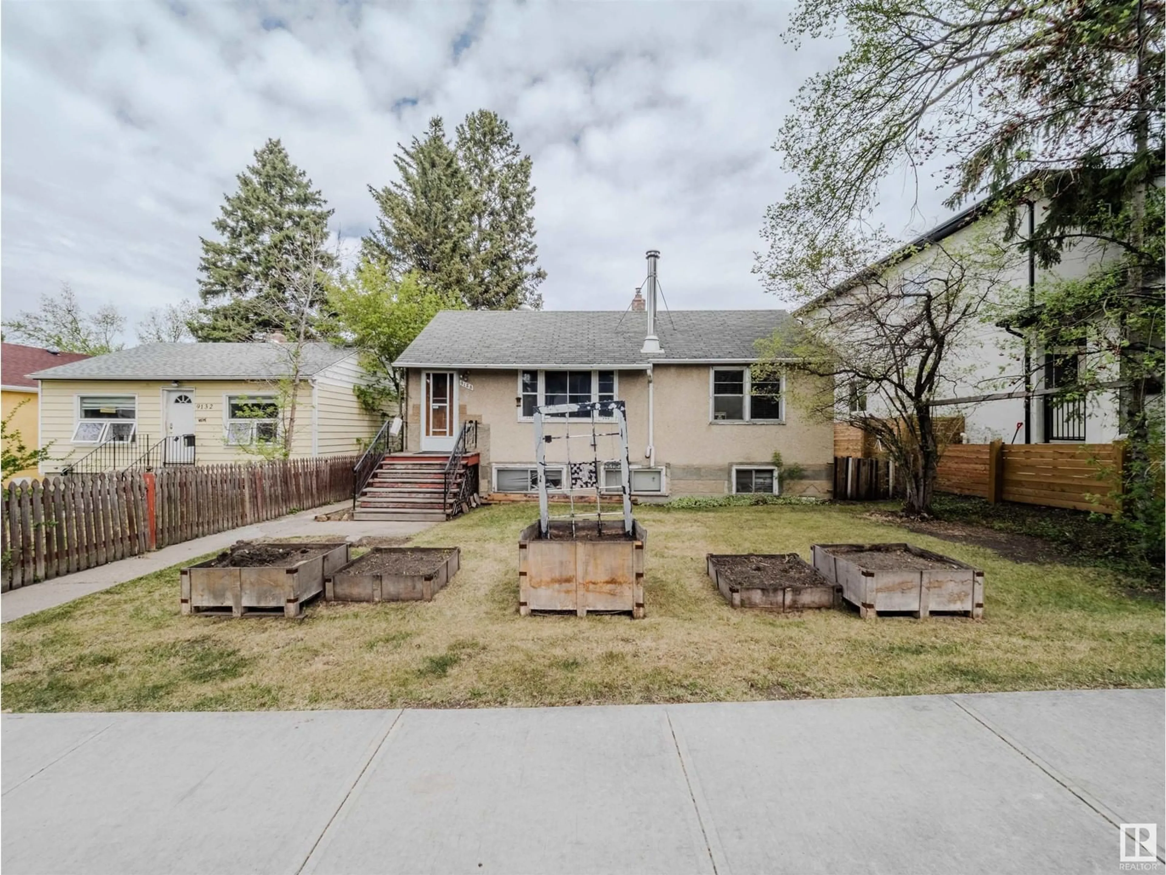 A pic from outside/outdoor area/front of a property/back of a property/a pic from drone, street for 9128 81 AV, Edmonton Alberta T6C0X1