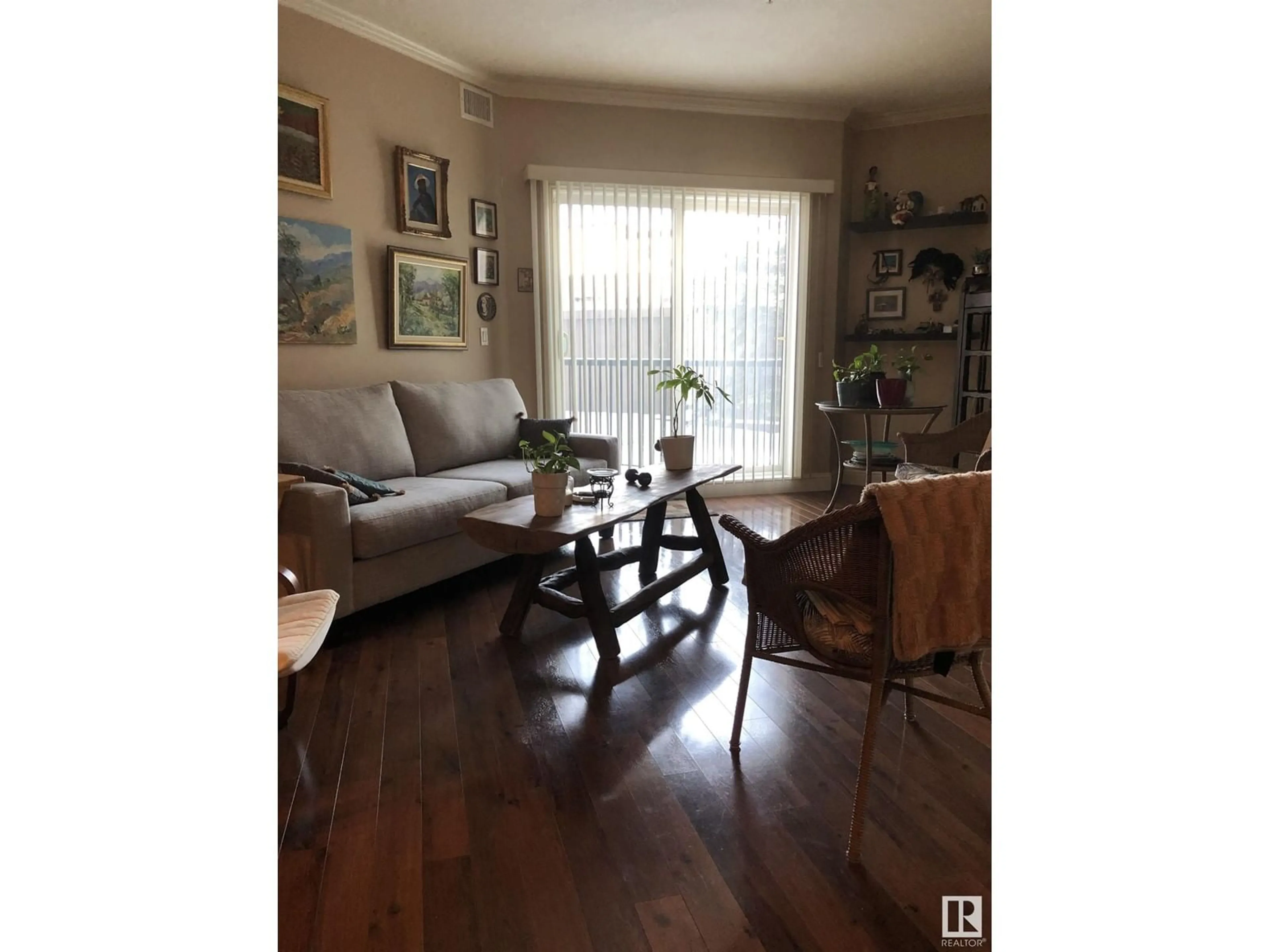 Living room with furniture, wood/laminate floor for #111 - 14604 125 ST, Edmonton Alberta T5X0B4