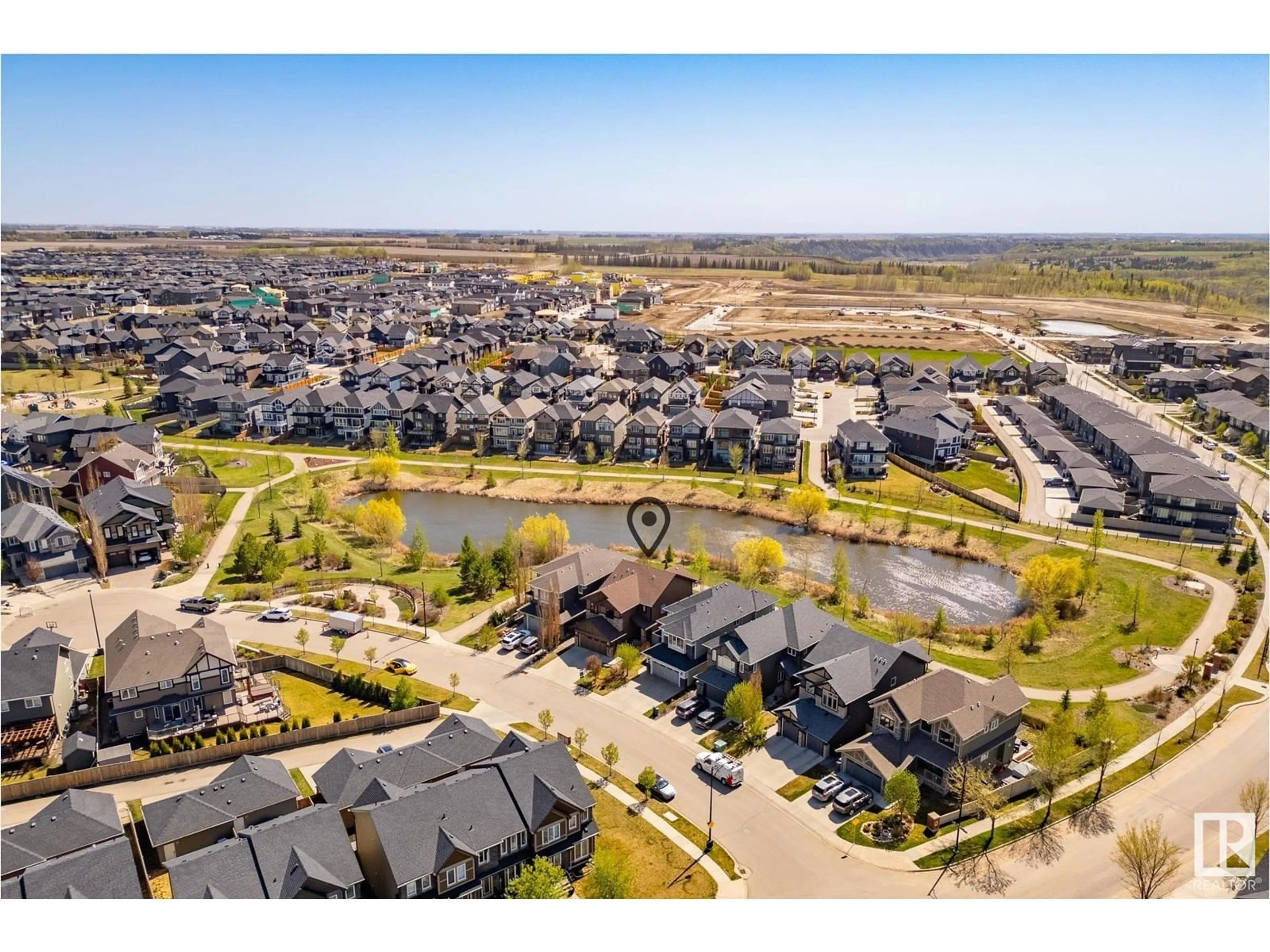 A pic from outside/outdoor area/front of a property/back of a property/a pic from drone, water/lake/river/ocean view for SW - 3811 KIDD BAY BA, Edmonton Alberta T6W2R3