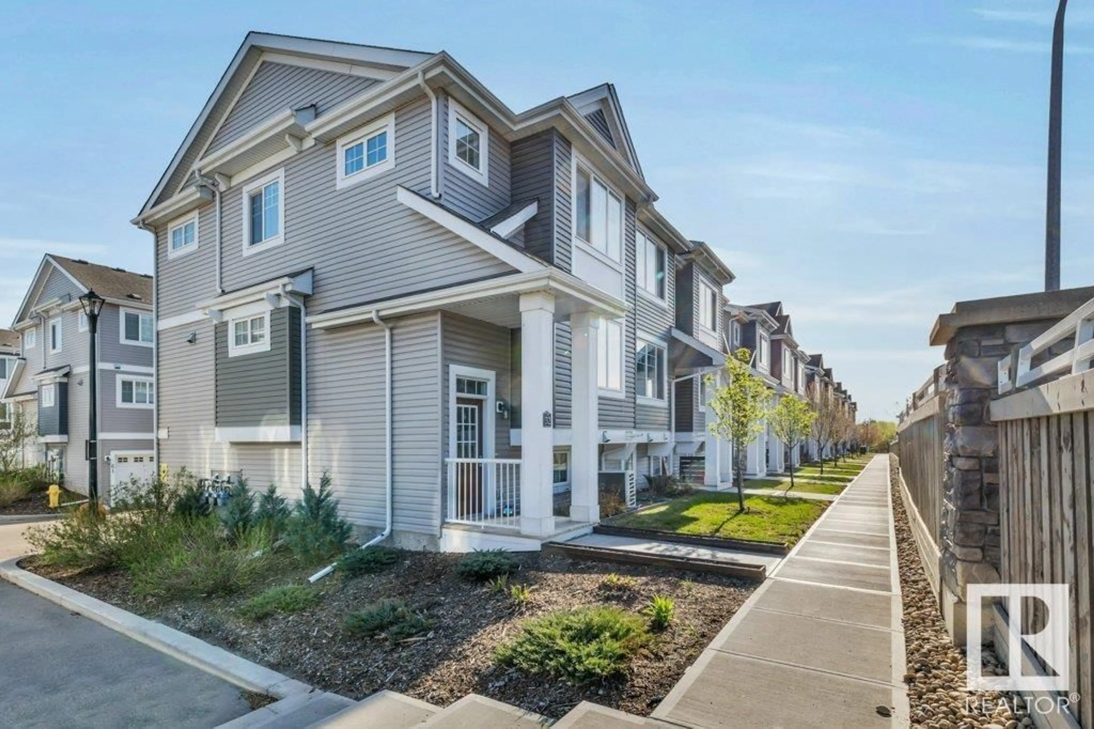 Home with vinyl exterior material, street for #32 - 1391 STARLING DR, Edmonton Alberta T5S0L3