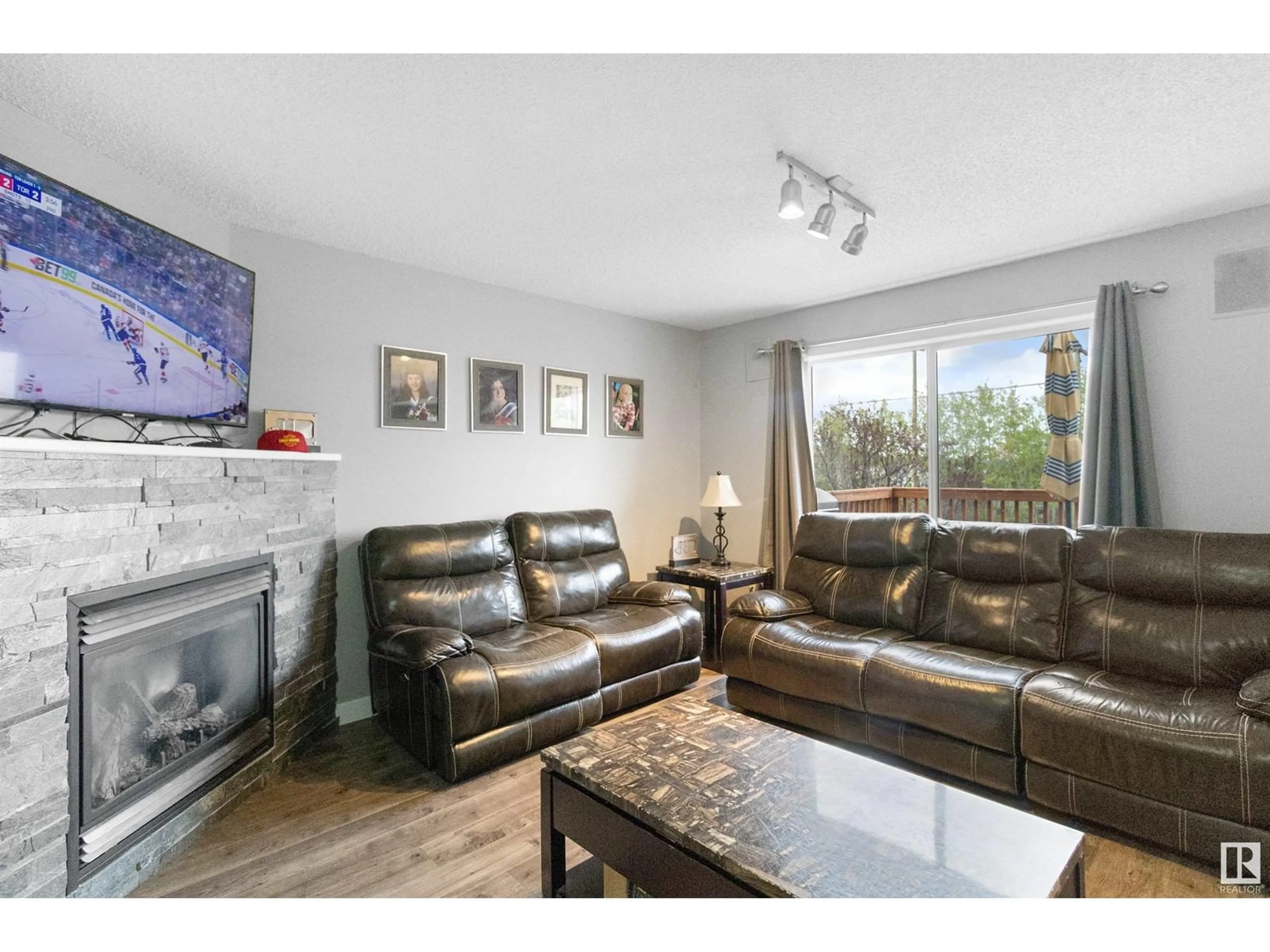 Living room with furniture, wood/laminate floor for 91 CHESTERMERE DR, Sherwood Park Alberta T8H2S1