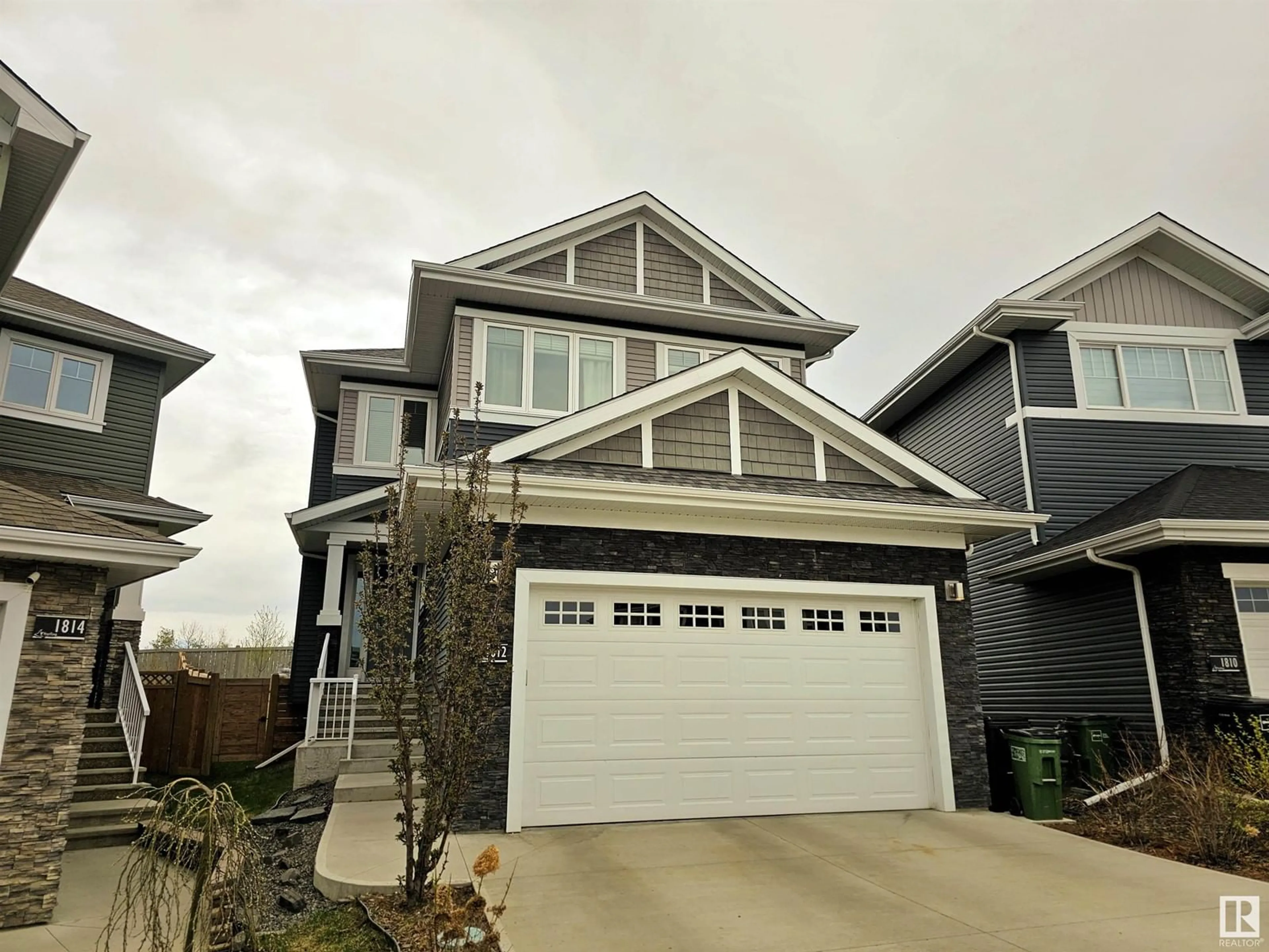 Home with vinyl exterior material, street for 1812 TANAGER CL, Edmonton Alberta T8N0N2