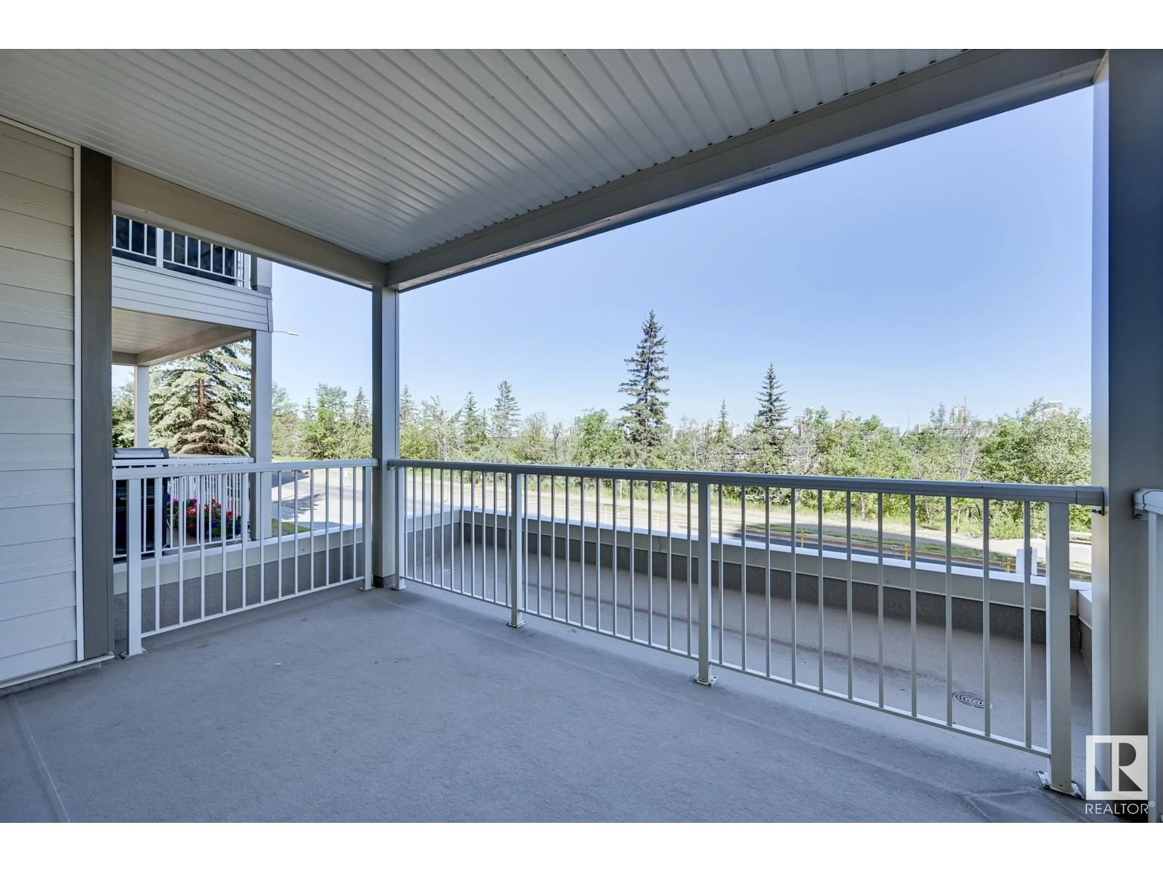 Patio, water/lake/river/ocean view for 202 - 10809 SASKATCHEWAN DR, Edmonton Alberta T6E4S5