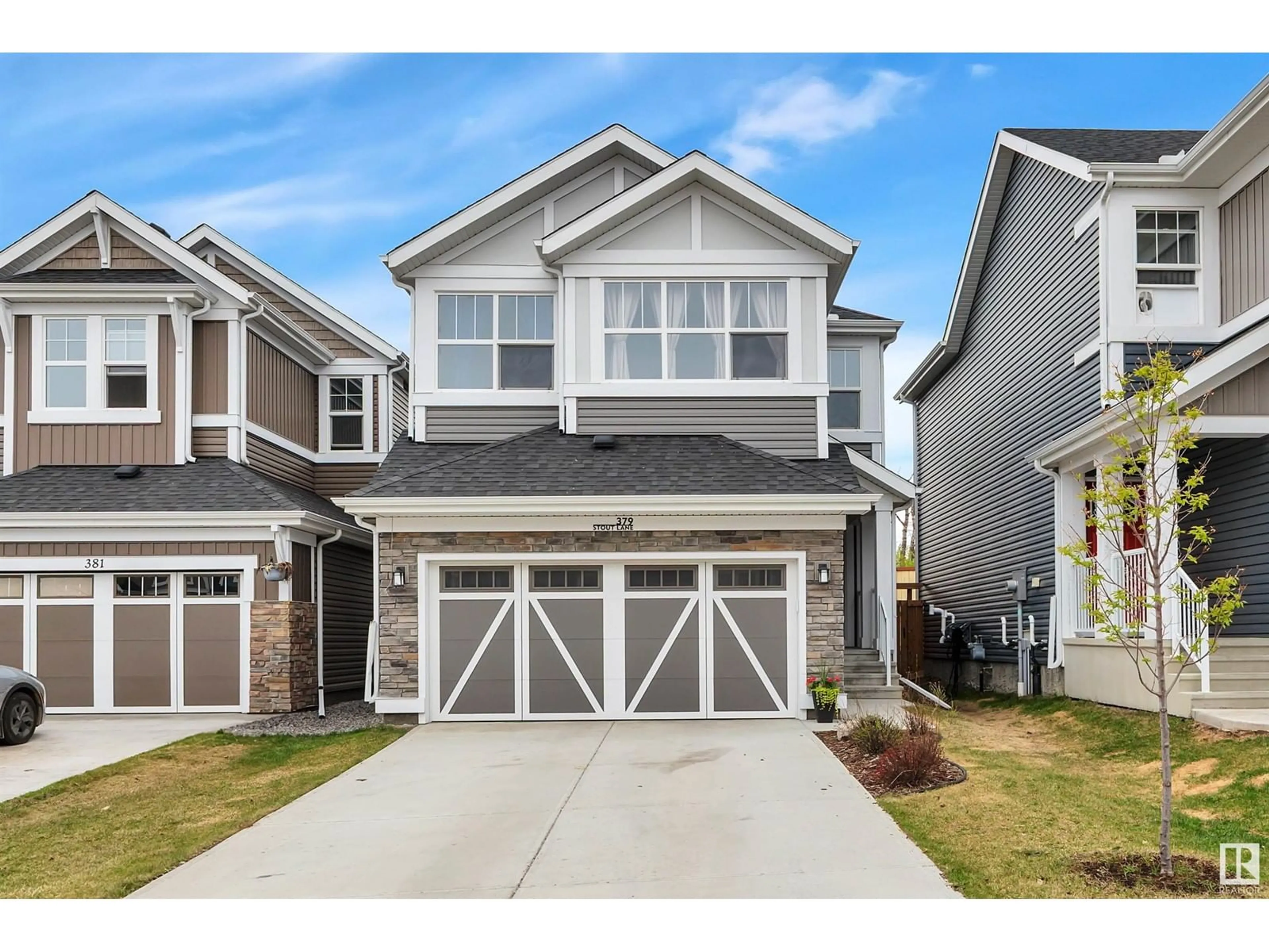 Home with vinyl exterior material, street for 379 STOUT LN, Leduc Alberta T9E1K4