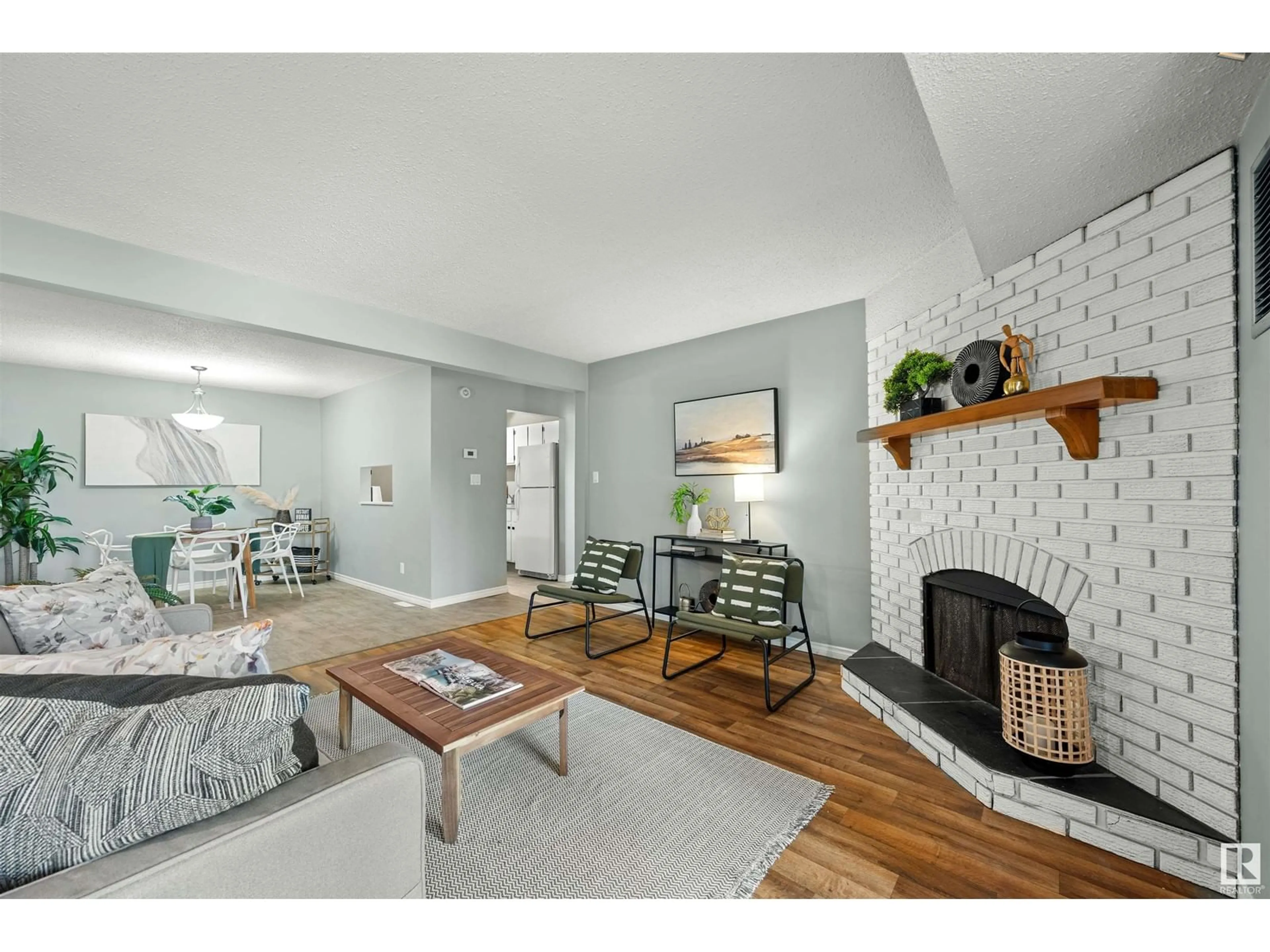 Living room with furniture, unknown for #103 - 10524 29 AV, Edmonton Alberta T6J4J2