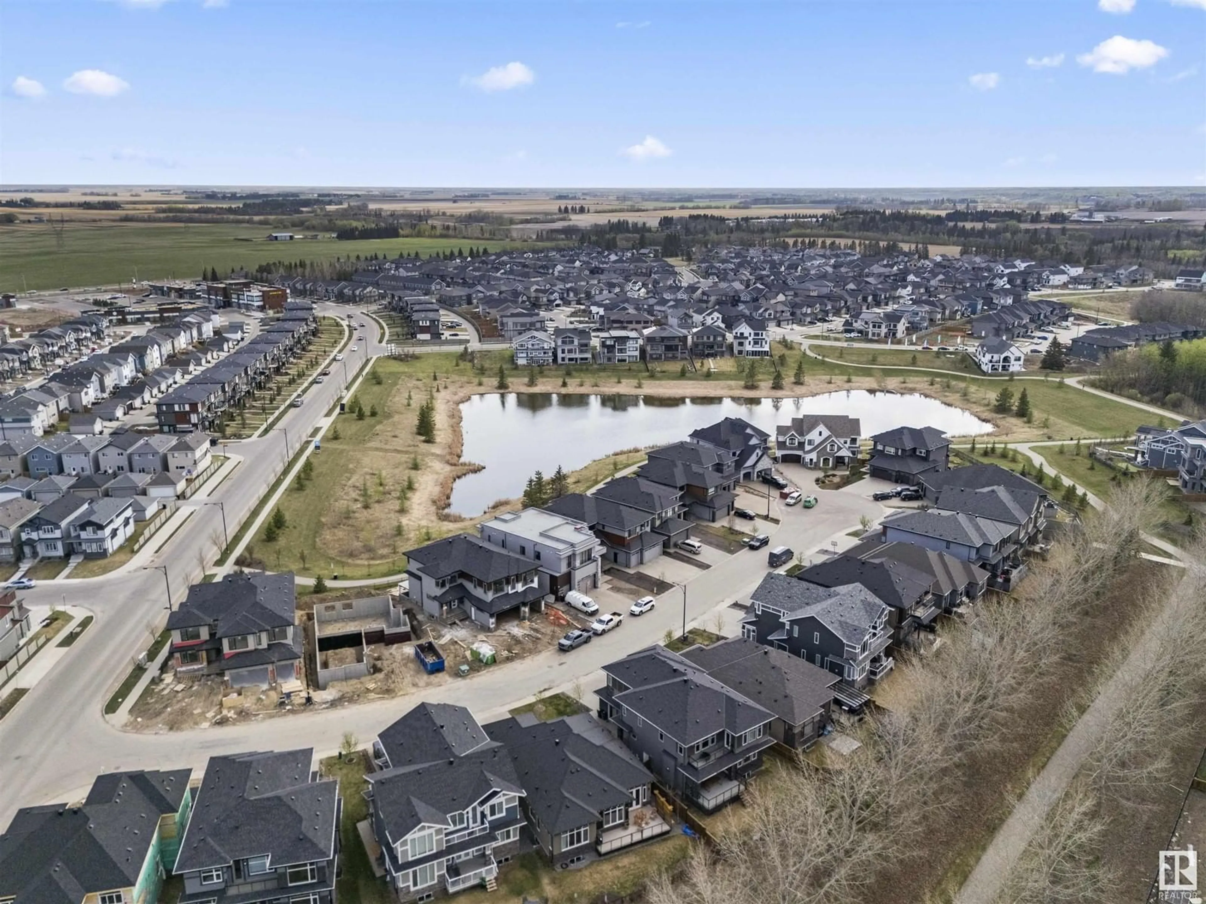 A pic from outside/outdoor area/front of a property/back of a property/a pic from drone, water/lake/river/ocean view for 5611 CAUTLEY COVE CV, Edmonton Alberta T6W4P7