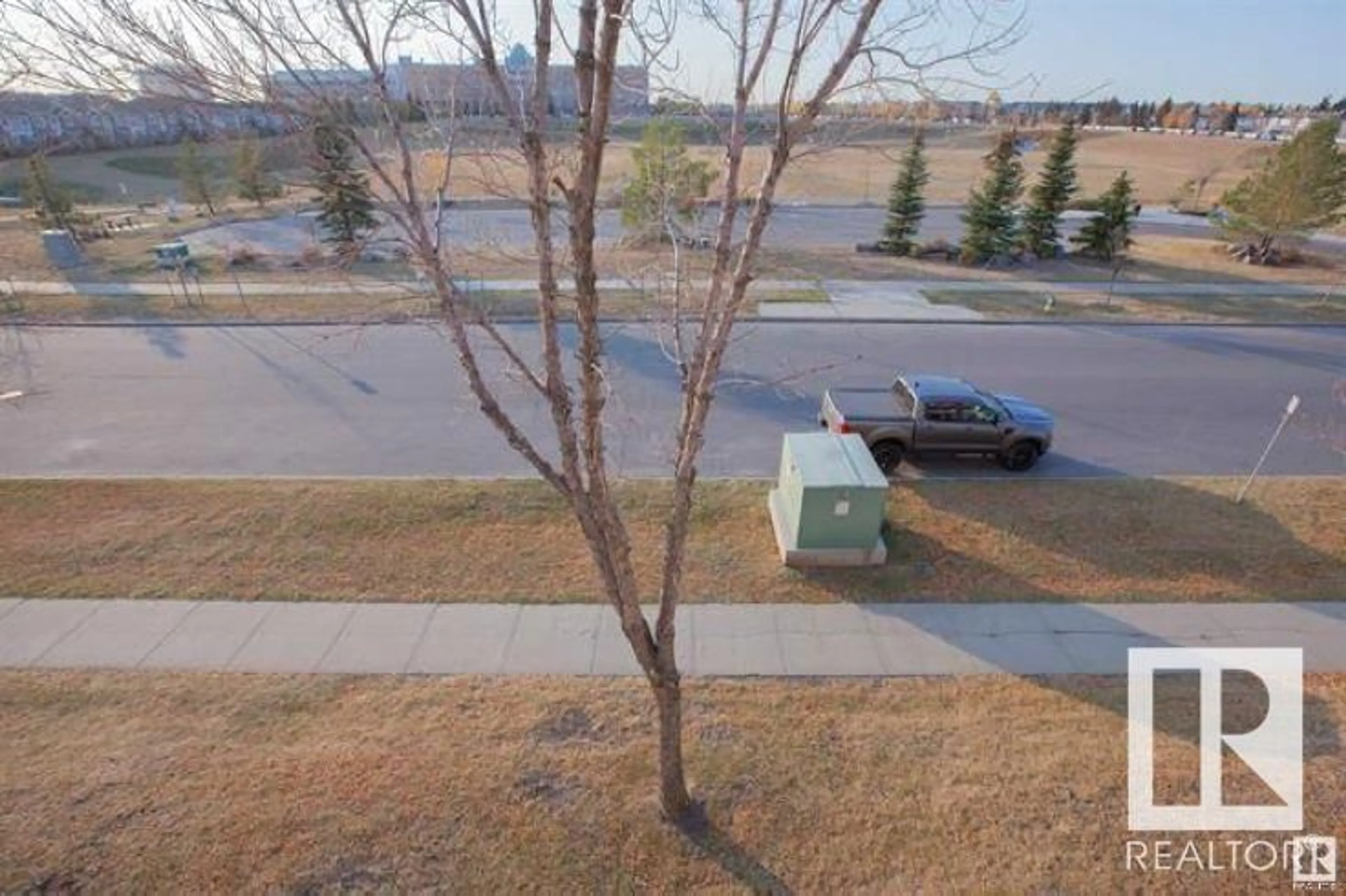 A pic from outside/outdoor area/front of a property/back of a property/a pic from drone, unknown for #310 - 5065 31 AV, Edmonton Alberta T6L6S5