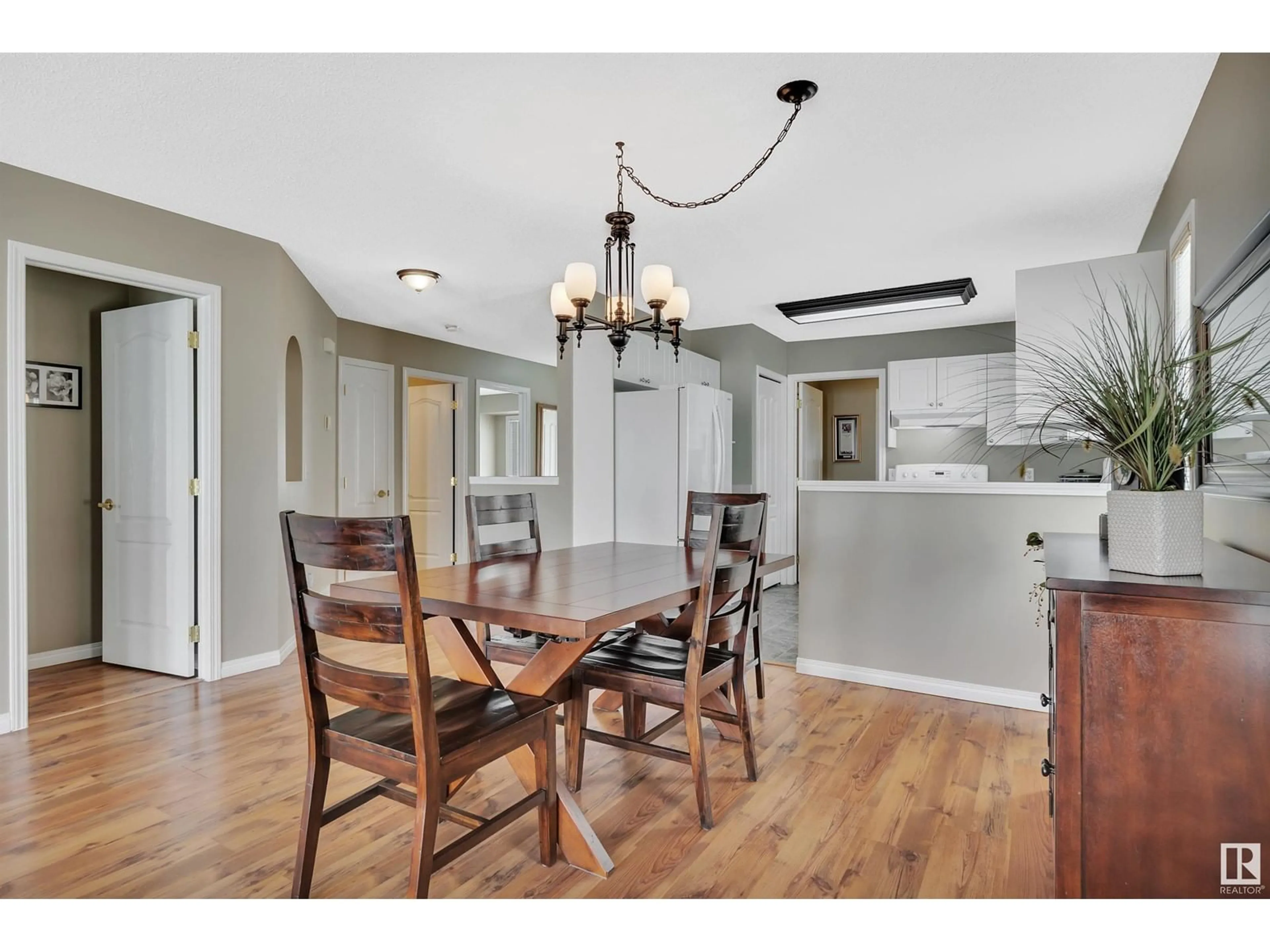 Dining room, wood/laminate floor for 43 14428 MILLER BV NW, Edmonton Alberta T5Y2Y6