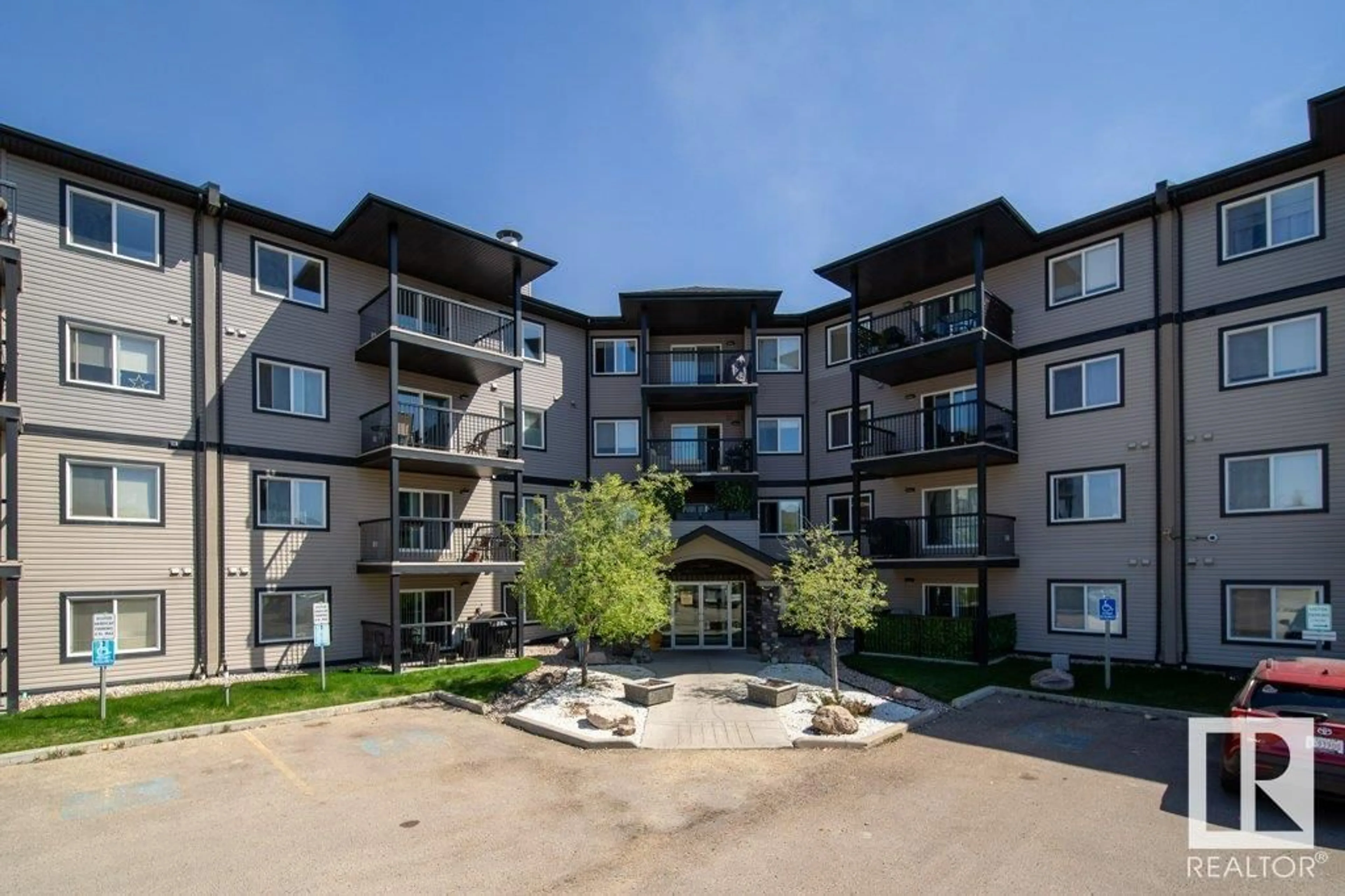 A pic from outside/outdoor area/front of a property/back of a property/a pic from drone, unknown for #105 - 5951 165 AV, Edmonton Alberta T5Y0J6