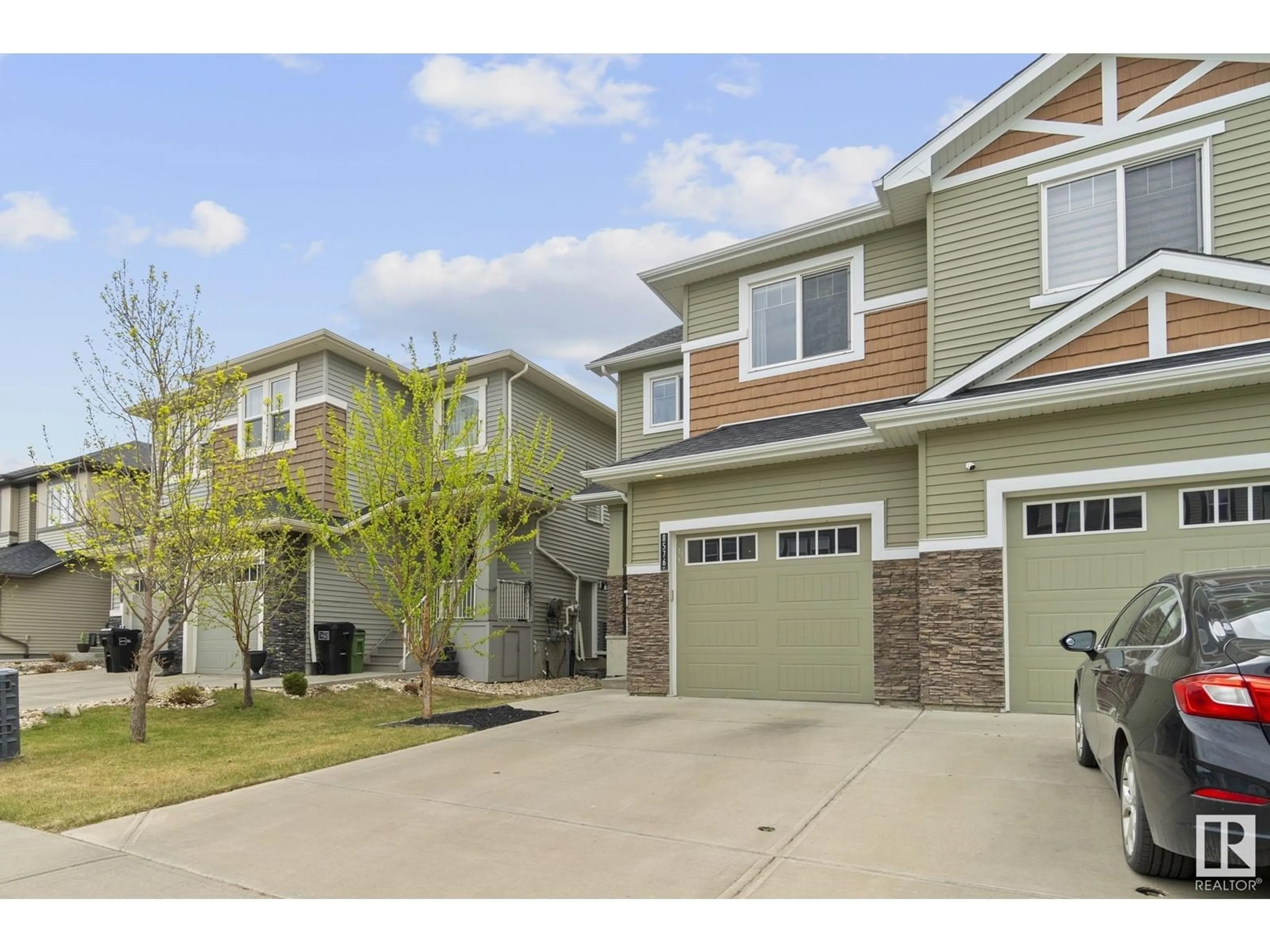 Home with vinyl exterior material, street for 8576 CUSHING PL SW, Edmonton Alberta T6W3R4