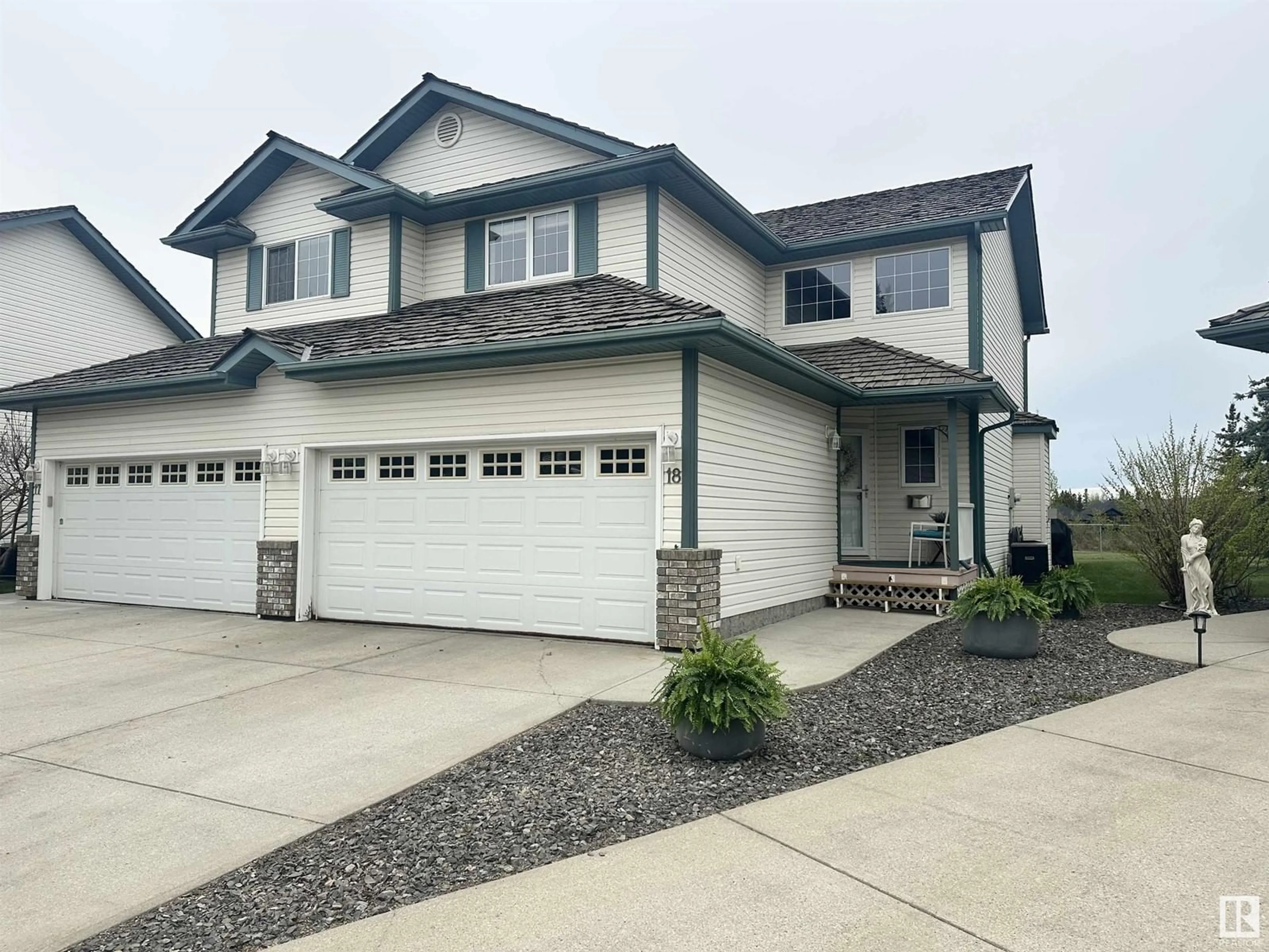 Home with vinyl exterior material, street for 18 211 BLACKBURN E SW, Edmonton Alberta T6W1C8