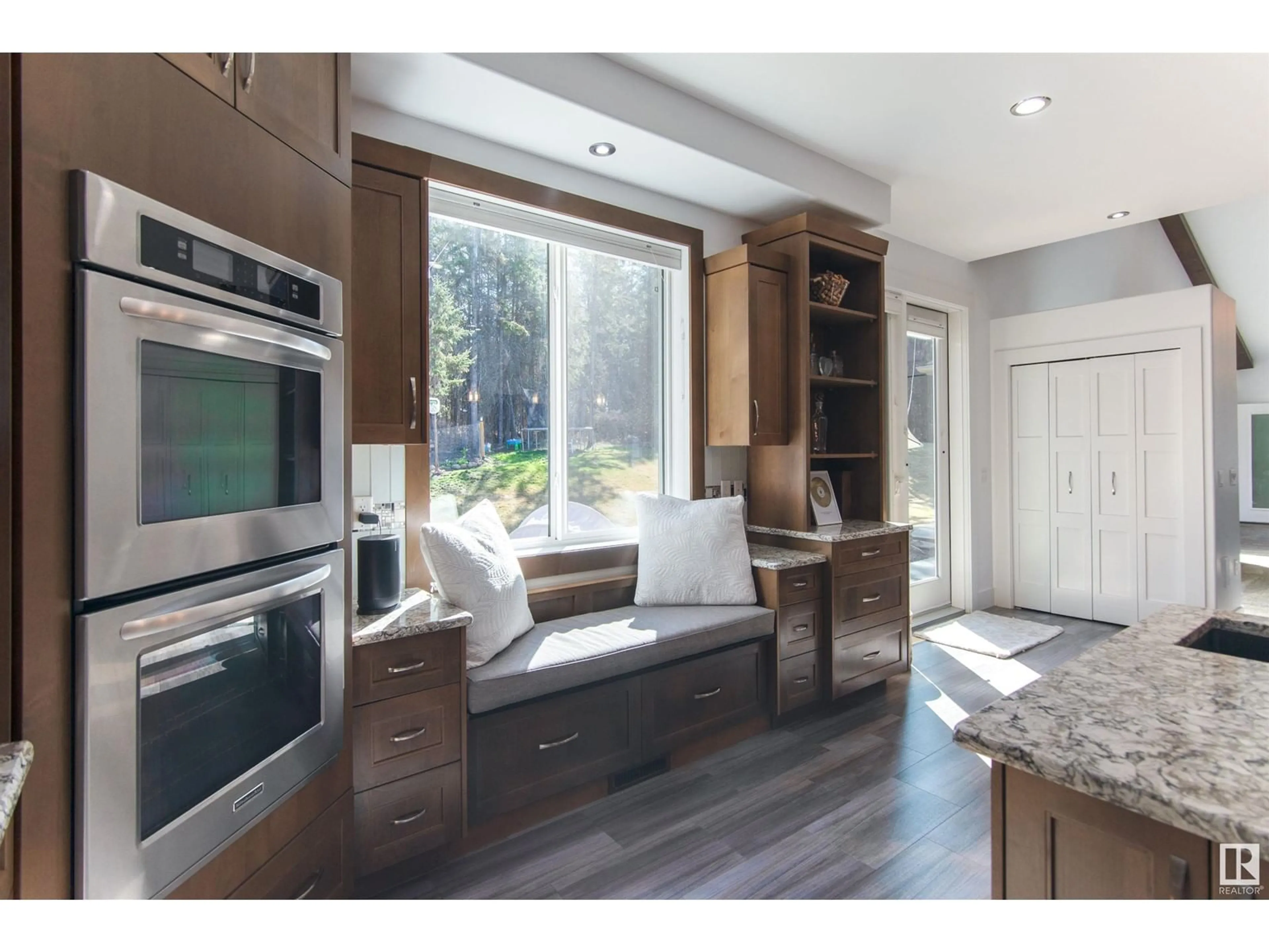 Open concept kitchen, wood/laminate floor for 61314 - 702 RG RD 463, Rural Bonnyville M.D. Alberta T9N2G8