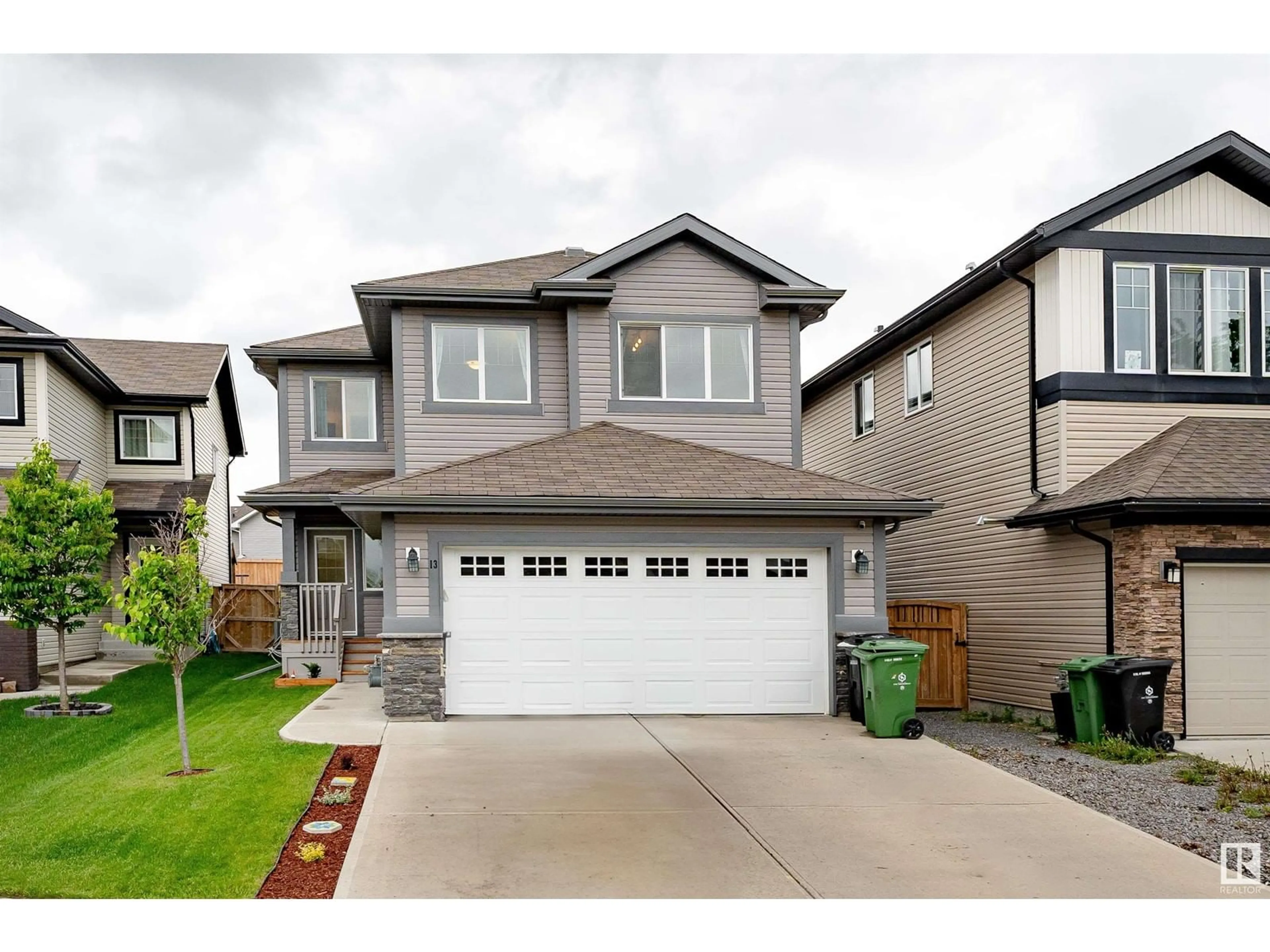 Home with vinyl exterior material, street for 13 SANTA FE CT, Fort Saskatchewan Alberta T8L0J6