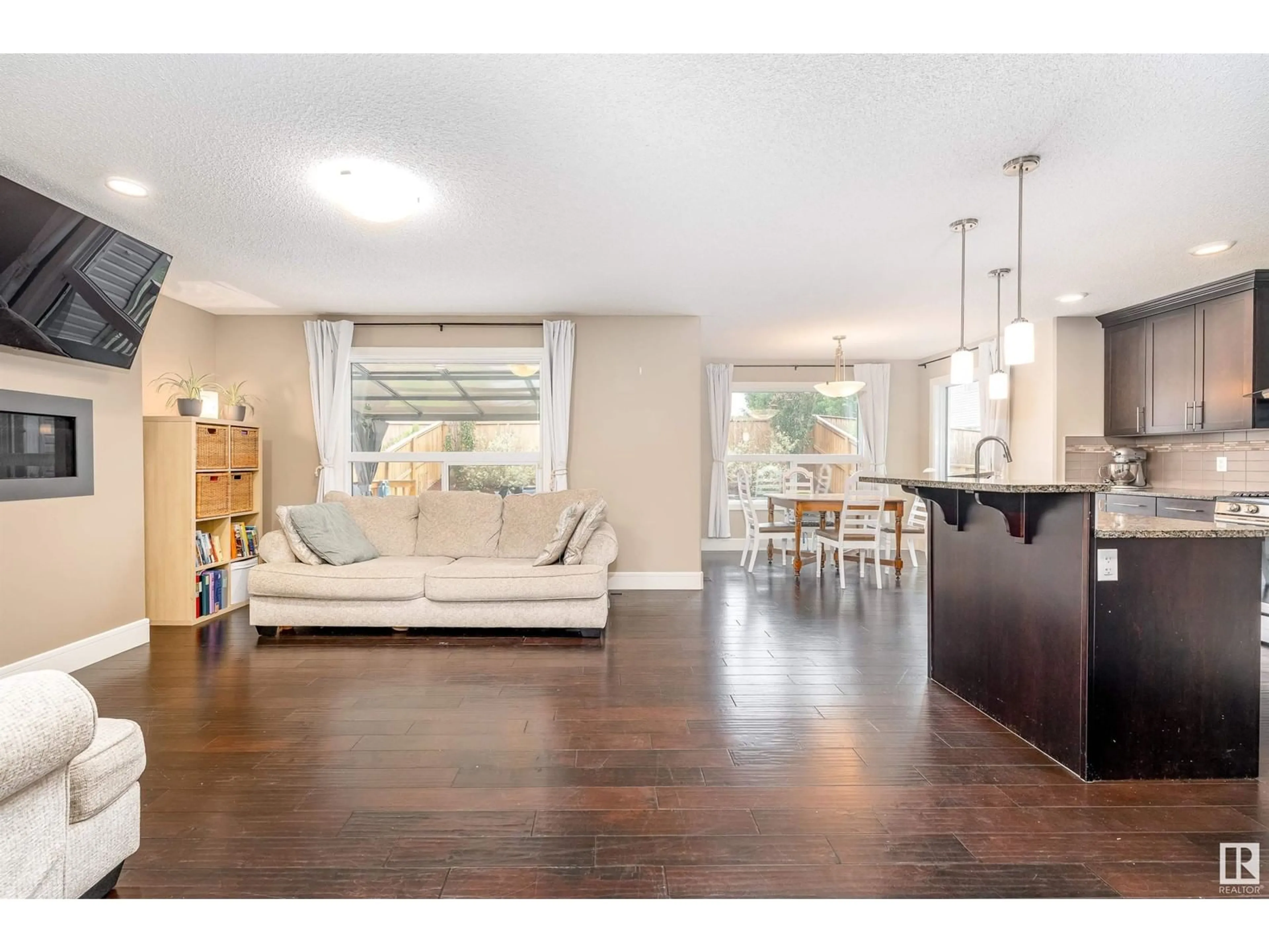 Open concept kitchen, wood/laminate floor for 13 SANTA FE CT, Fort Saskatchewan Alberta T8L0J6