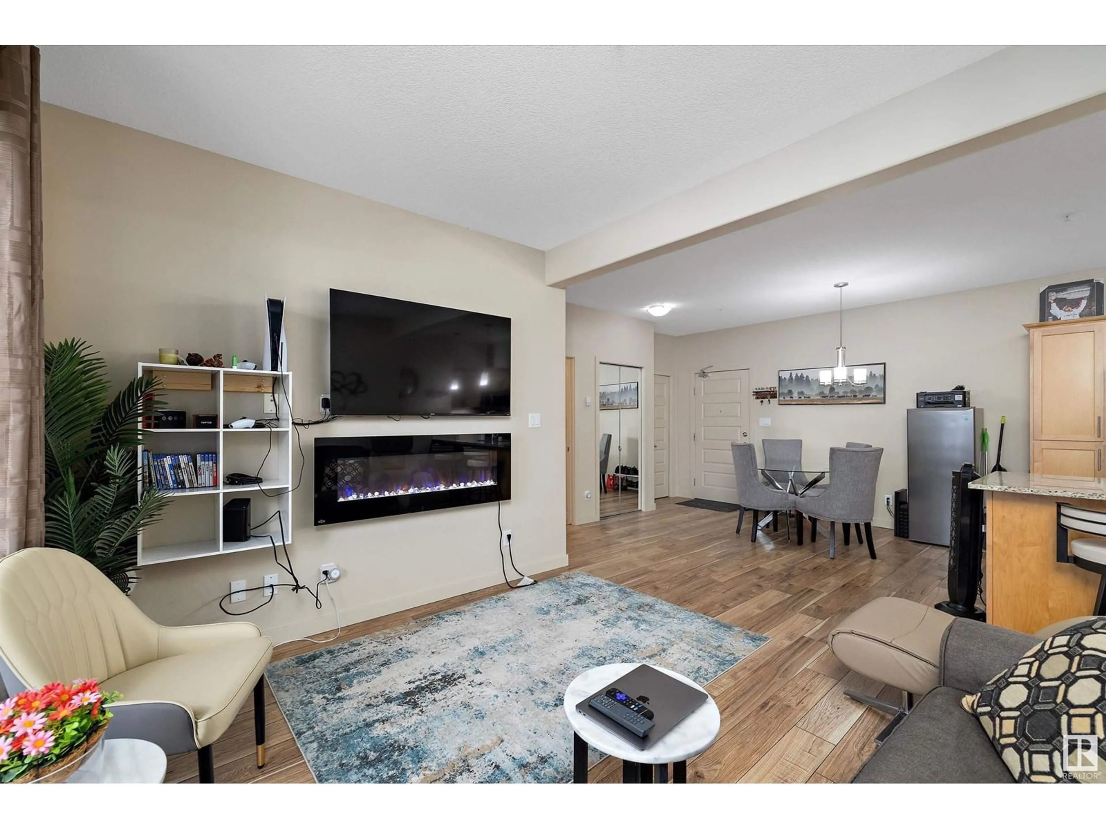 Living room with furniture, unknown for #214 - 304 AMBLESIDE LI, Edmonton Alberta T6W0V2
