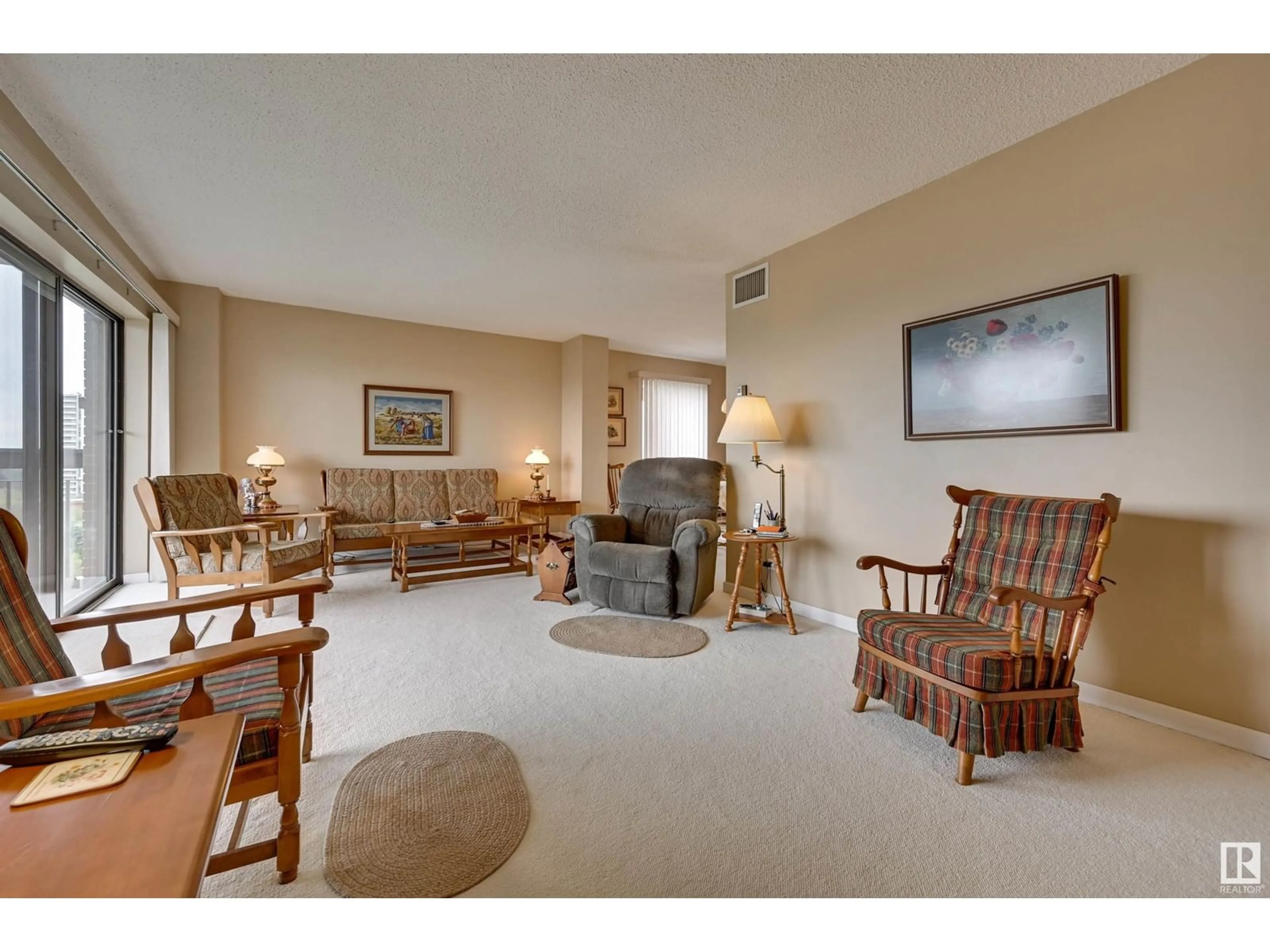 Living room with furniture, carpet floor for 903 - 11027 87 AV, Edmonton Alberta T6G2P9