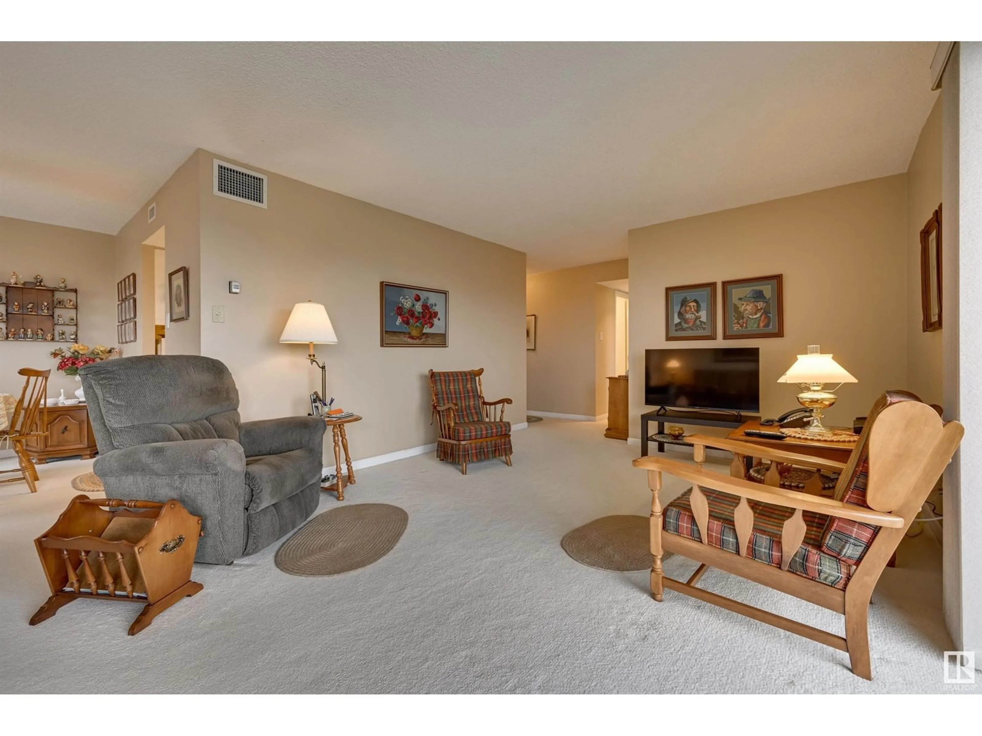 Living room with furniture, carpet floor for 903 - 11027 87 AV, Edmonton Alberta T6G2P9