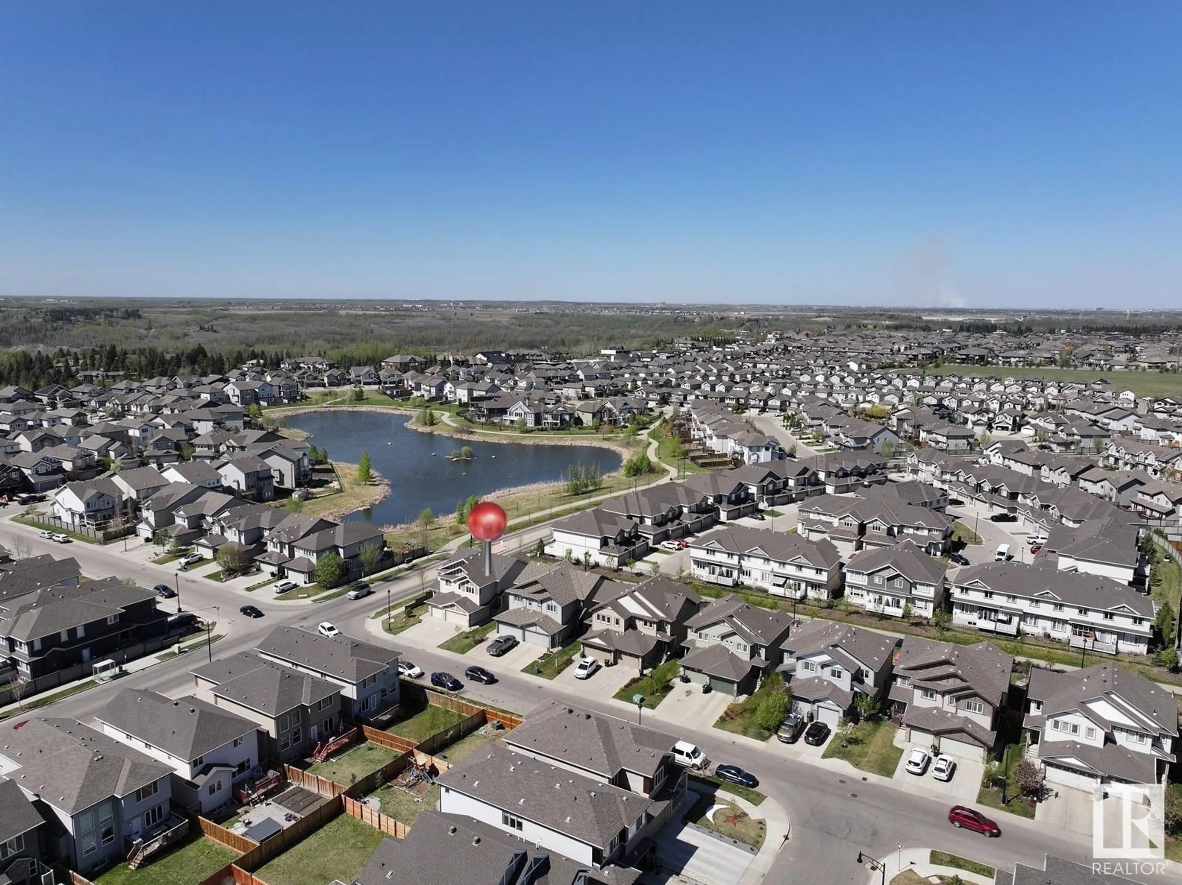 A pic from outside/outdoor area/front of a property/back of a property/a pic from drone, water/lake/river/ocean view for 17720 8 AV, Edmonton Alberta T6W2S6