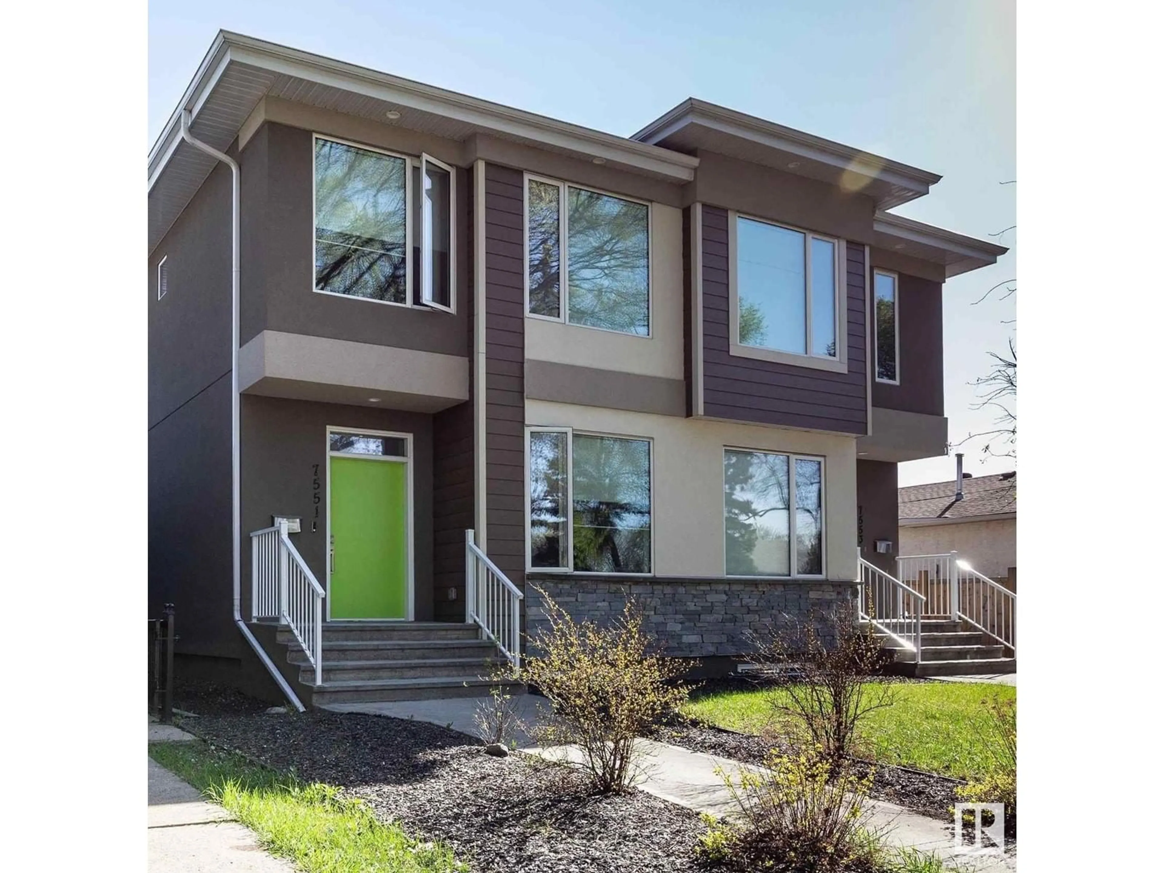 Home with vinyl exterior material, street for 7551 80 AV, Edmonton Alberta T6C0S3