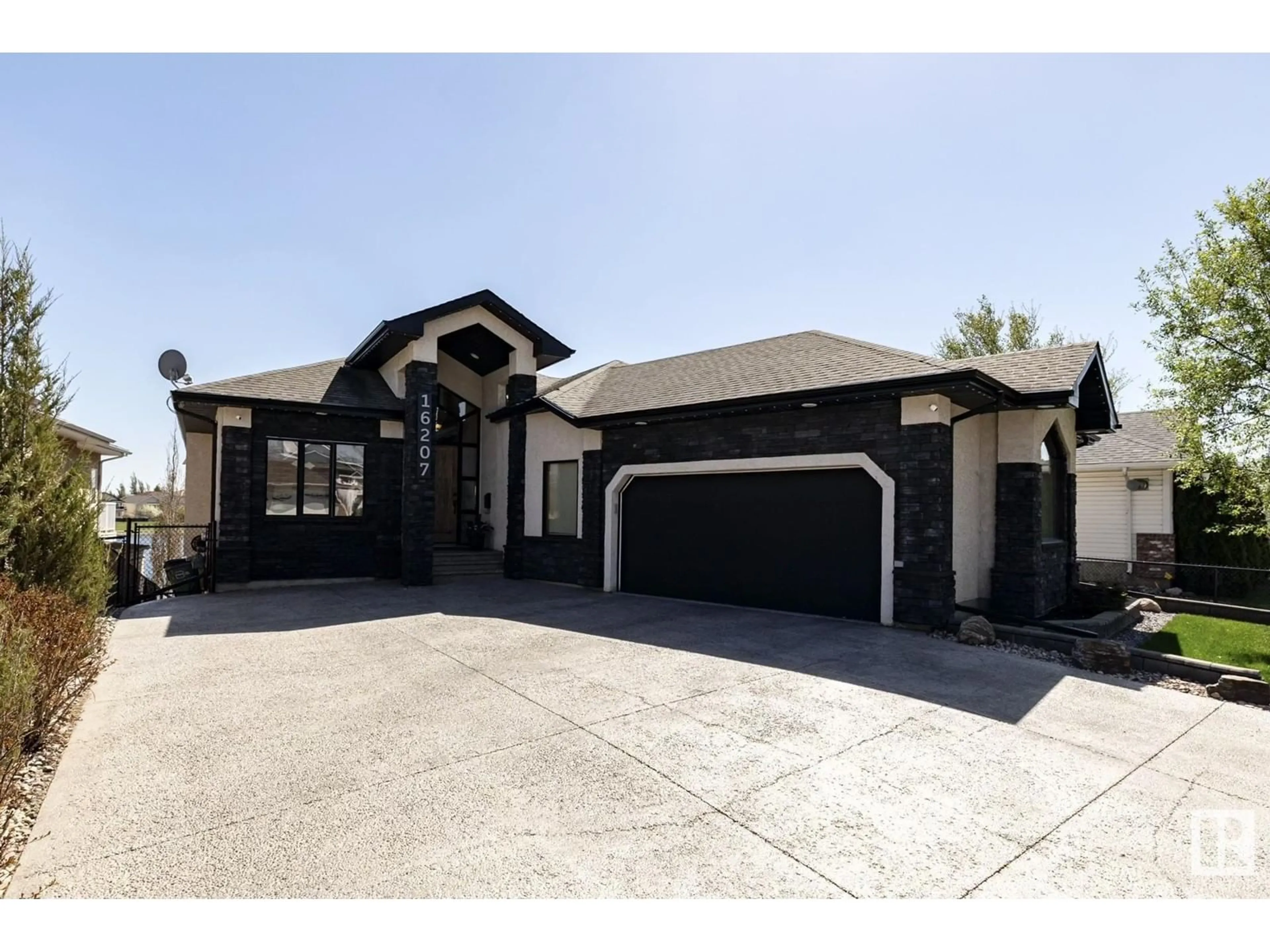Home with brick exterior material, street for NW - 16207 89 ST, Edmonton Alberta T5Z3M3