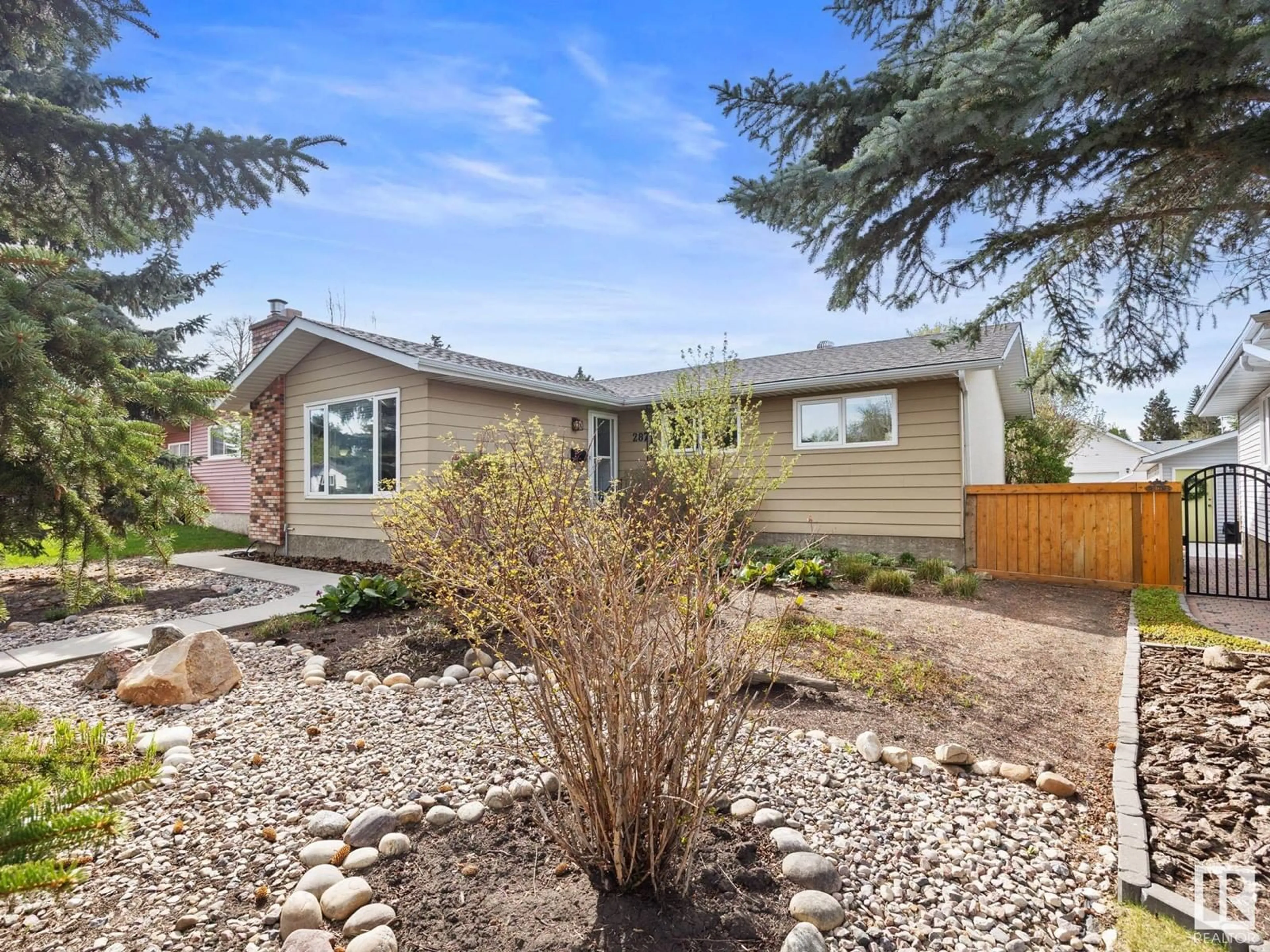 Home with vinyl exterior material, street for NW - 287 KNOTTWOOD RD N, Edmonton Alberta T6K2G5