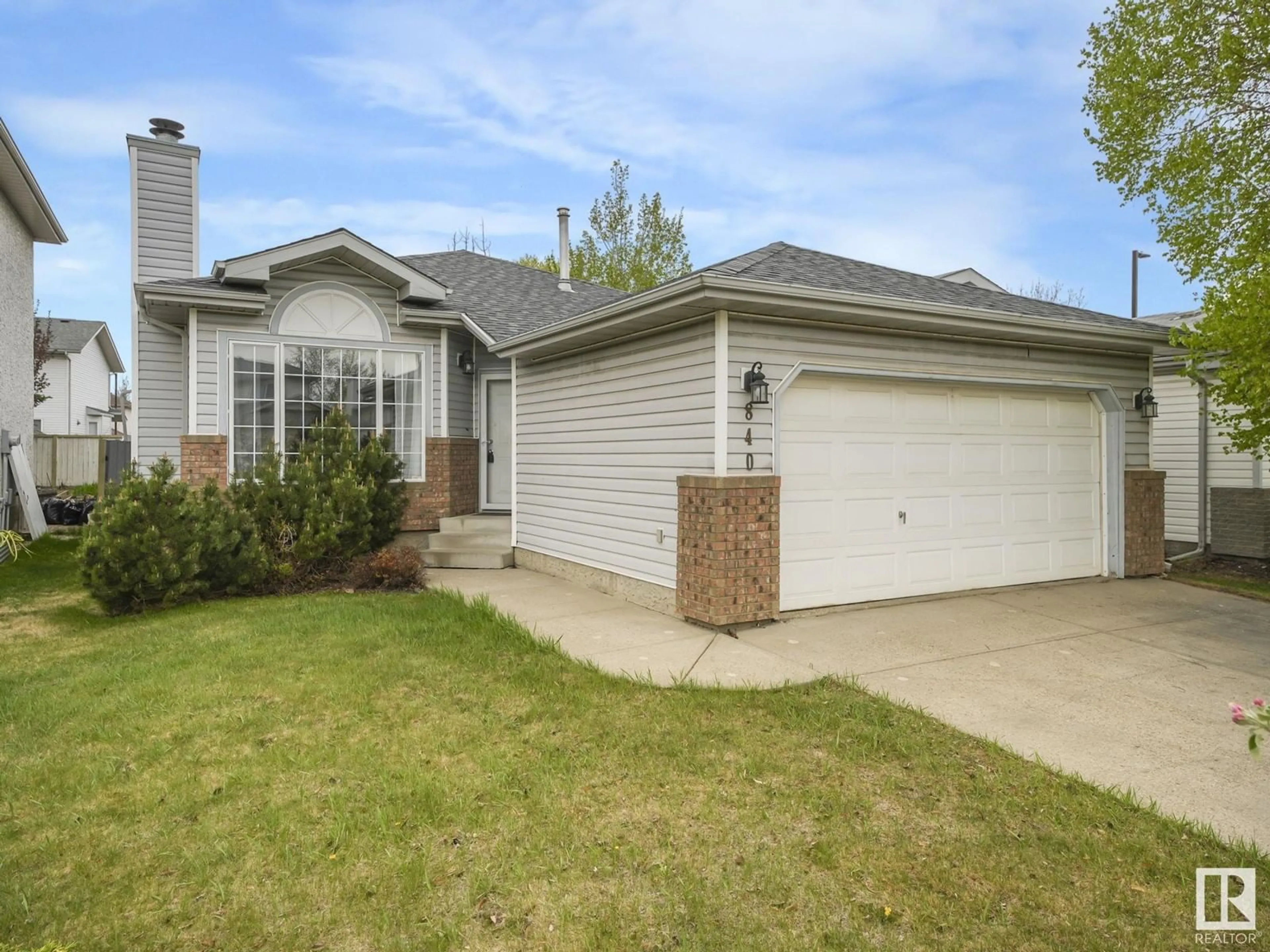 Home with vinyl exterior material, street for 840 113A ST ST, Edmonton Alberta T6J6W4