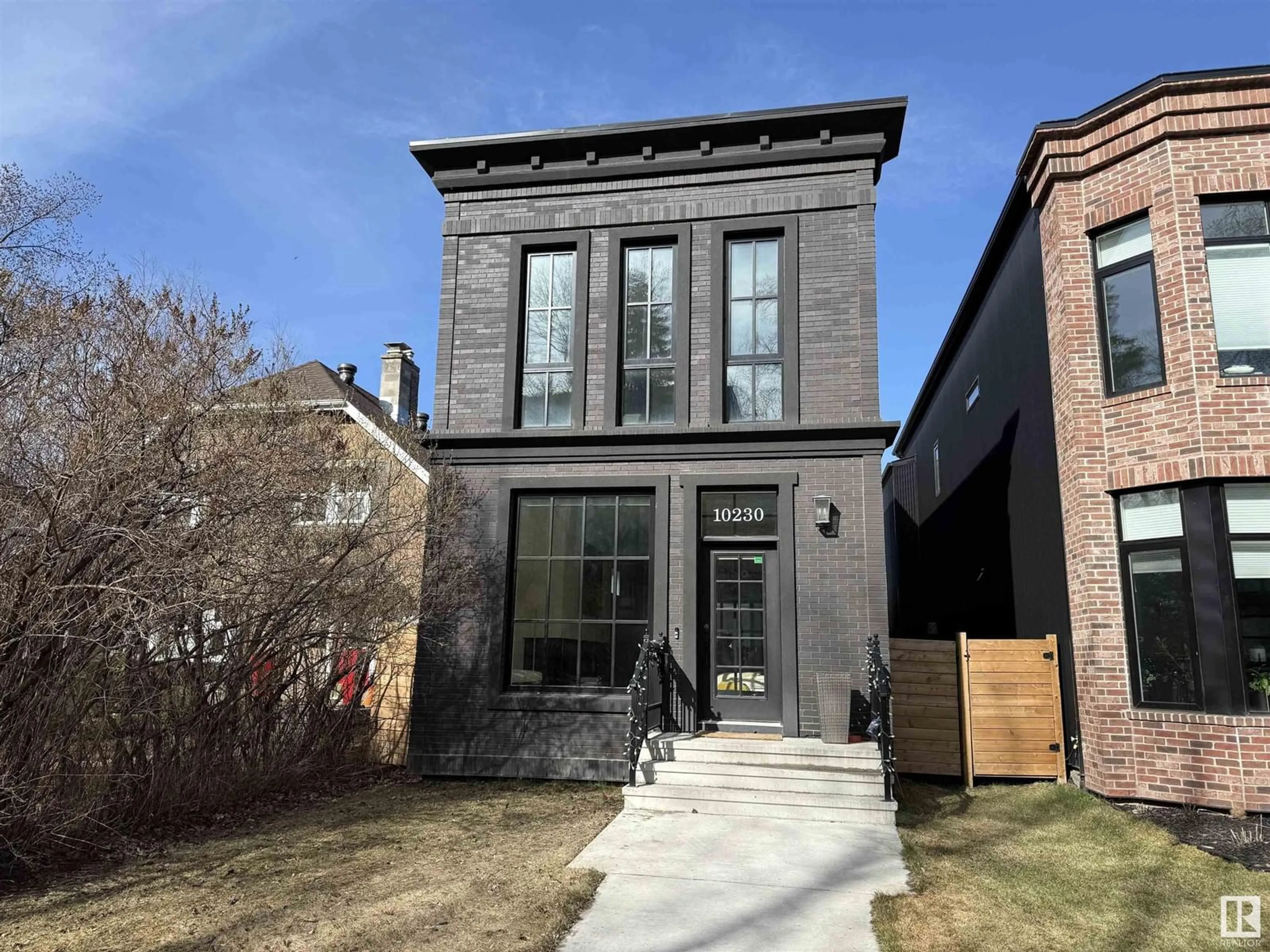Home with brick exterior material, street for NW - 10230 125 ST, Edmonton Alberta T5N1S9