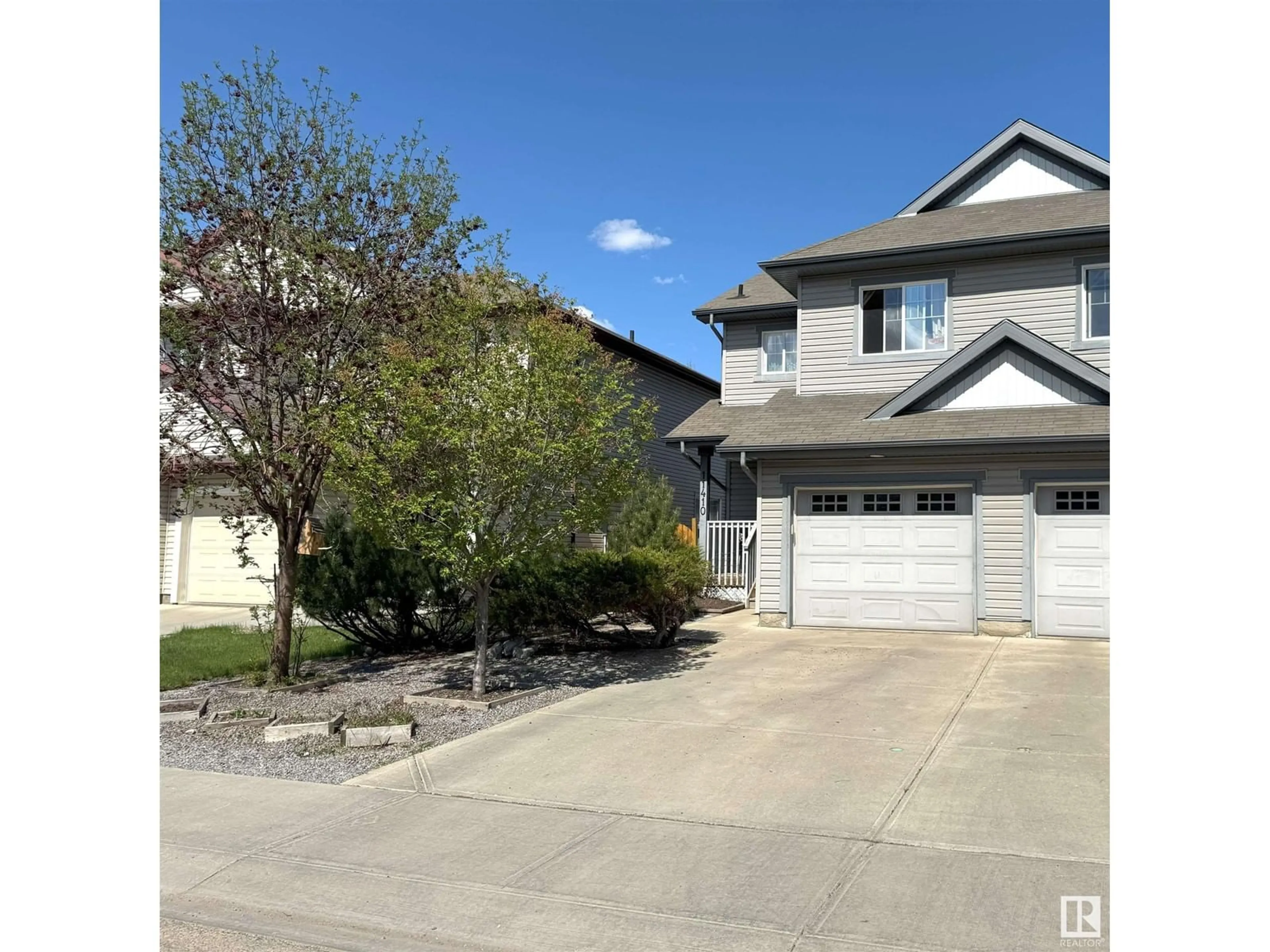 A pic from outside/outdoor area/front of a property/back of a property/a pic from drone, street for 11410 14 AV, Edmonton Alberta T6W0N5