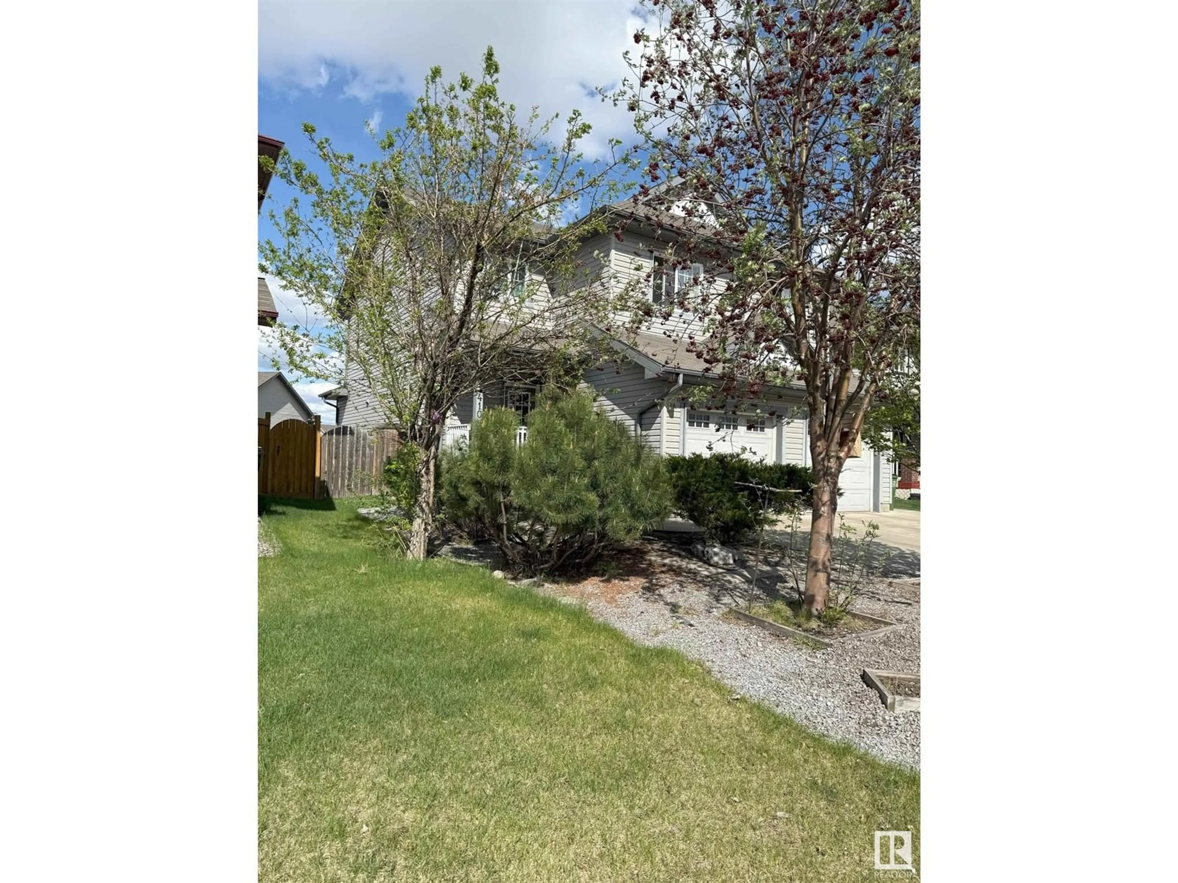 A pic from outside/outdoor area/front of a property/back of a property/a pic from drone, street for 11410 14 AV, Edmonton Alberta T6W0N5