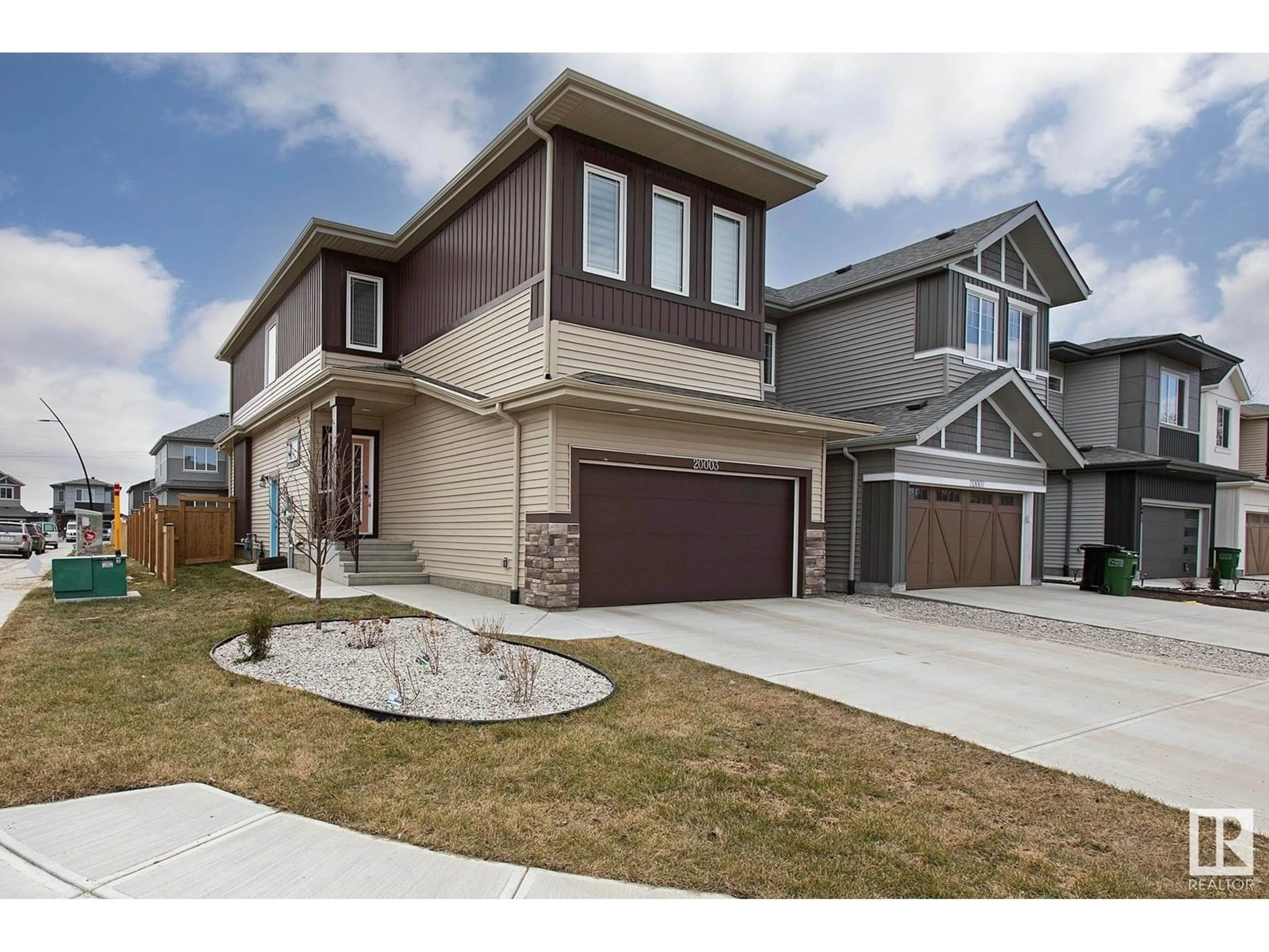 Home with brick exterior material, street for NW - 20003 31 AVENUE, Edmonton Alberta T6M1N7