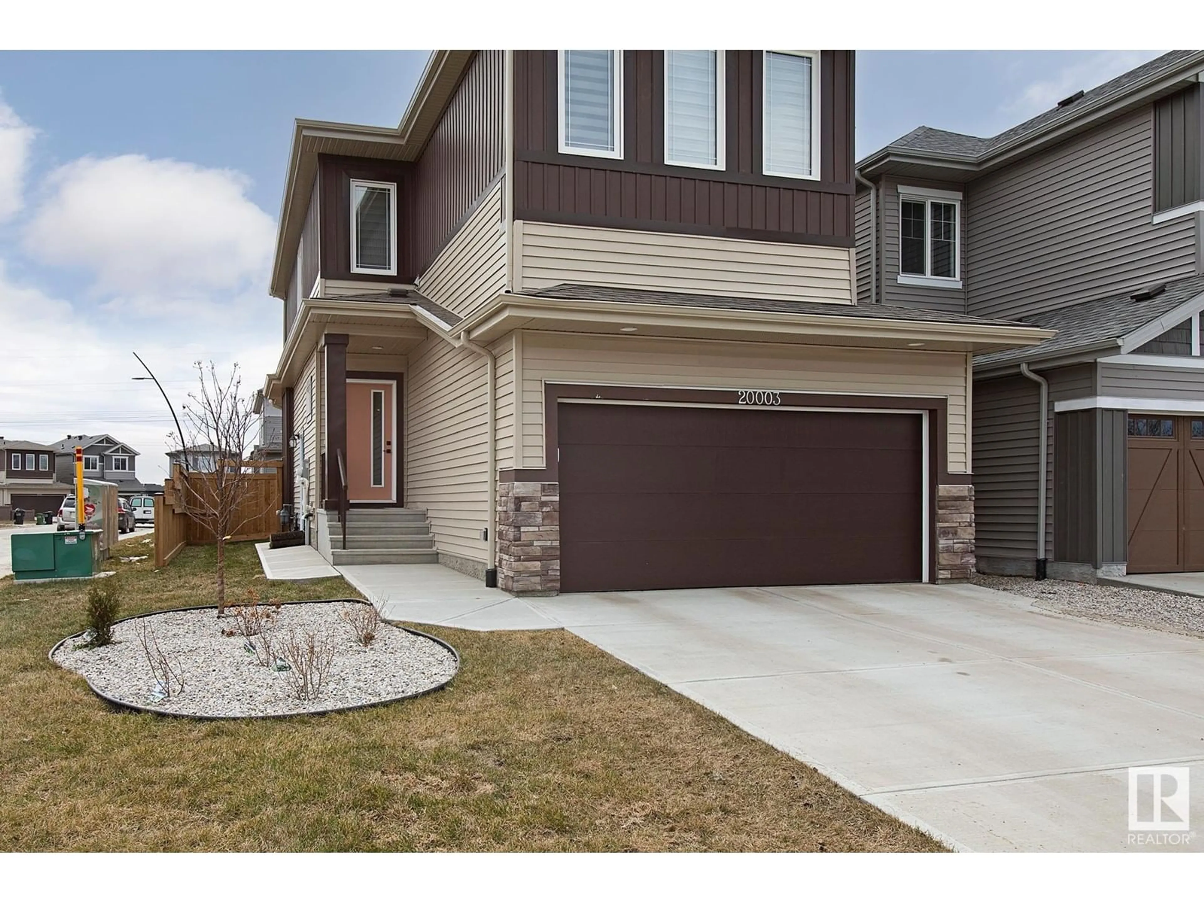 Home with brick exterior material, street for NW - 20003 31 AVENUE, Edmonton Alberta T6M1N7