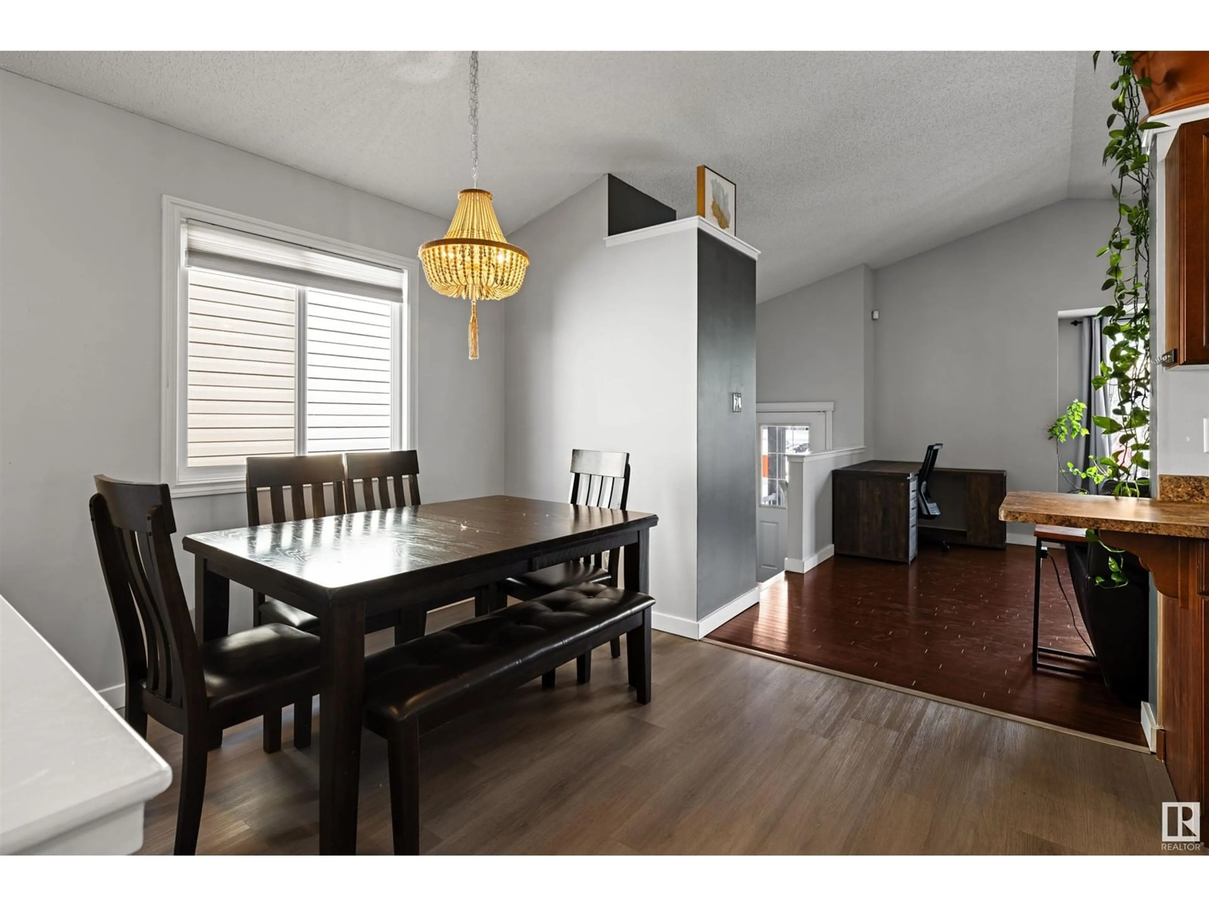 Dining room, wood/laminate floor for NW - 1543 35 AV, Edmonton Alberta T6T0M9