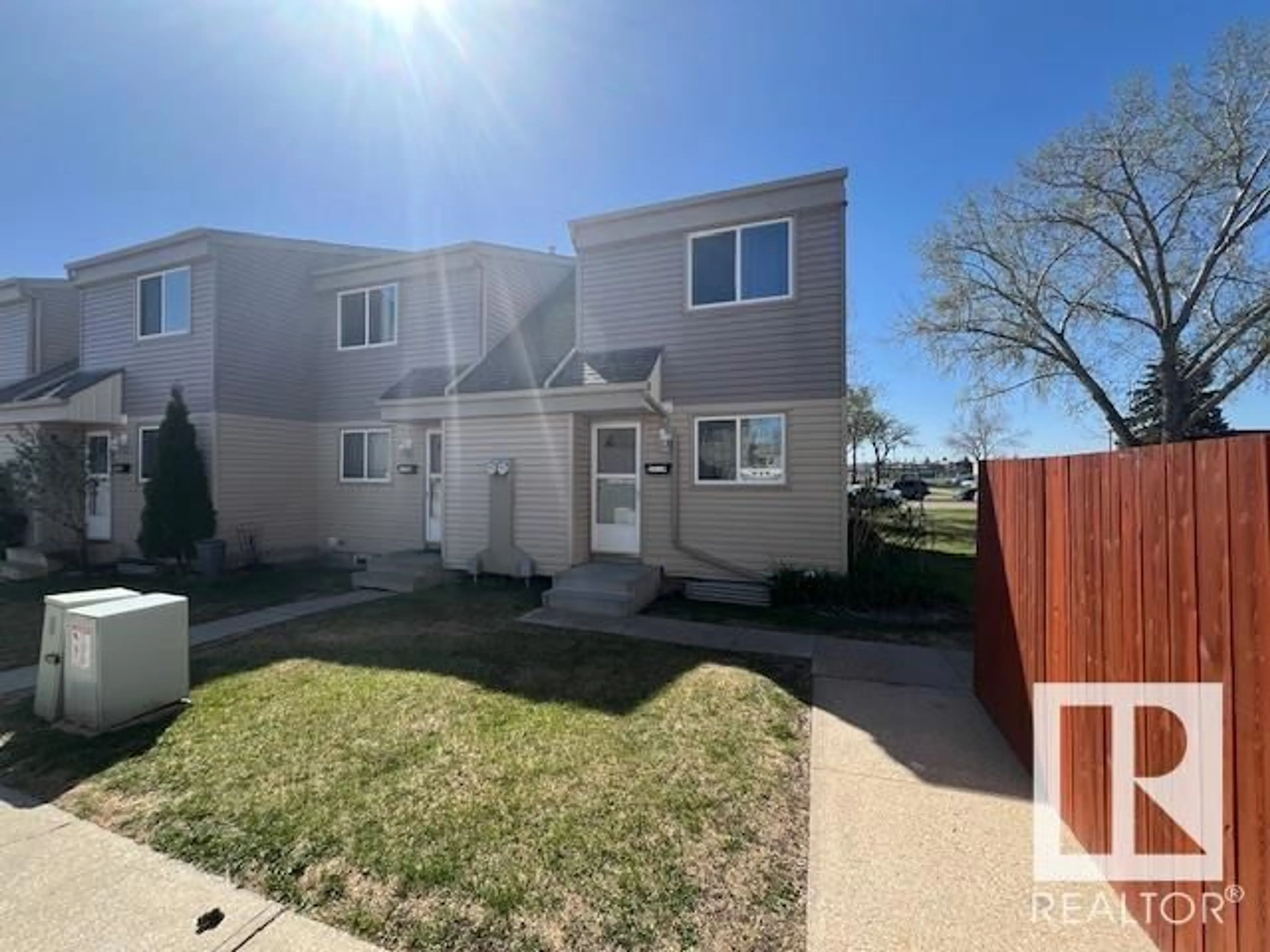 Home with vinyl exterior material, street for 5610 148 ST, Edmonton Alberta T6H4T8