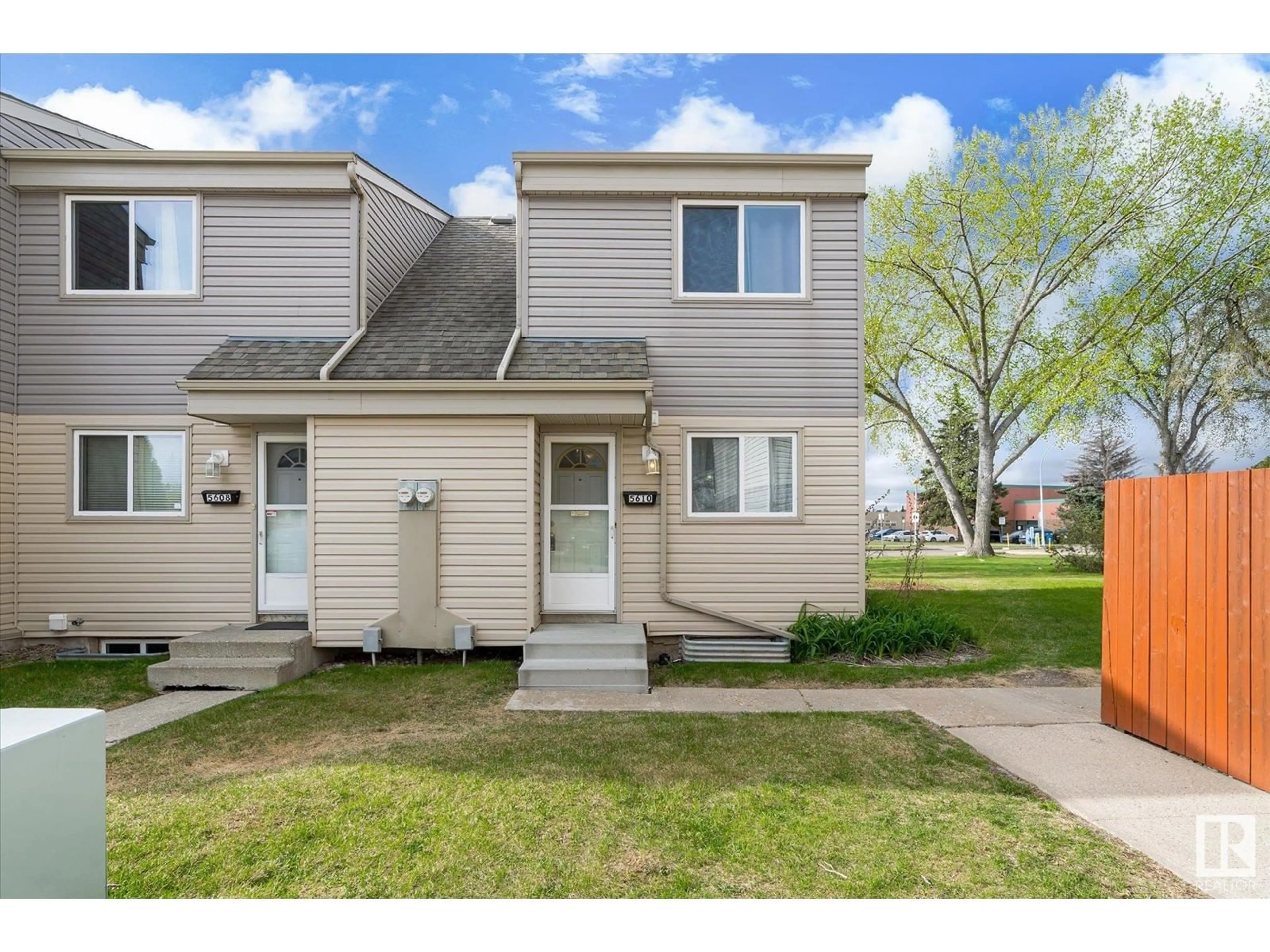 Home with vinyl exterior material, street for 5610 148 ST, Edmonton Alberta T6H4T8