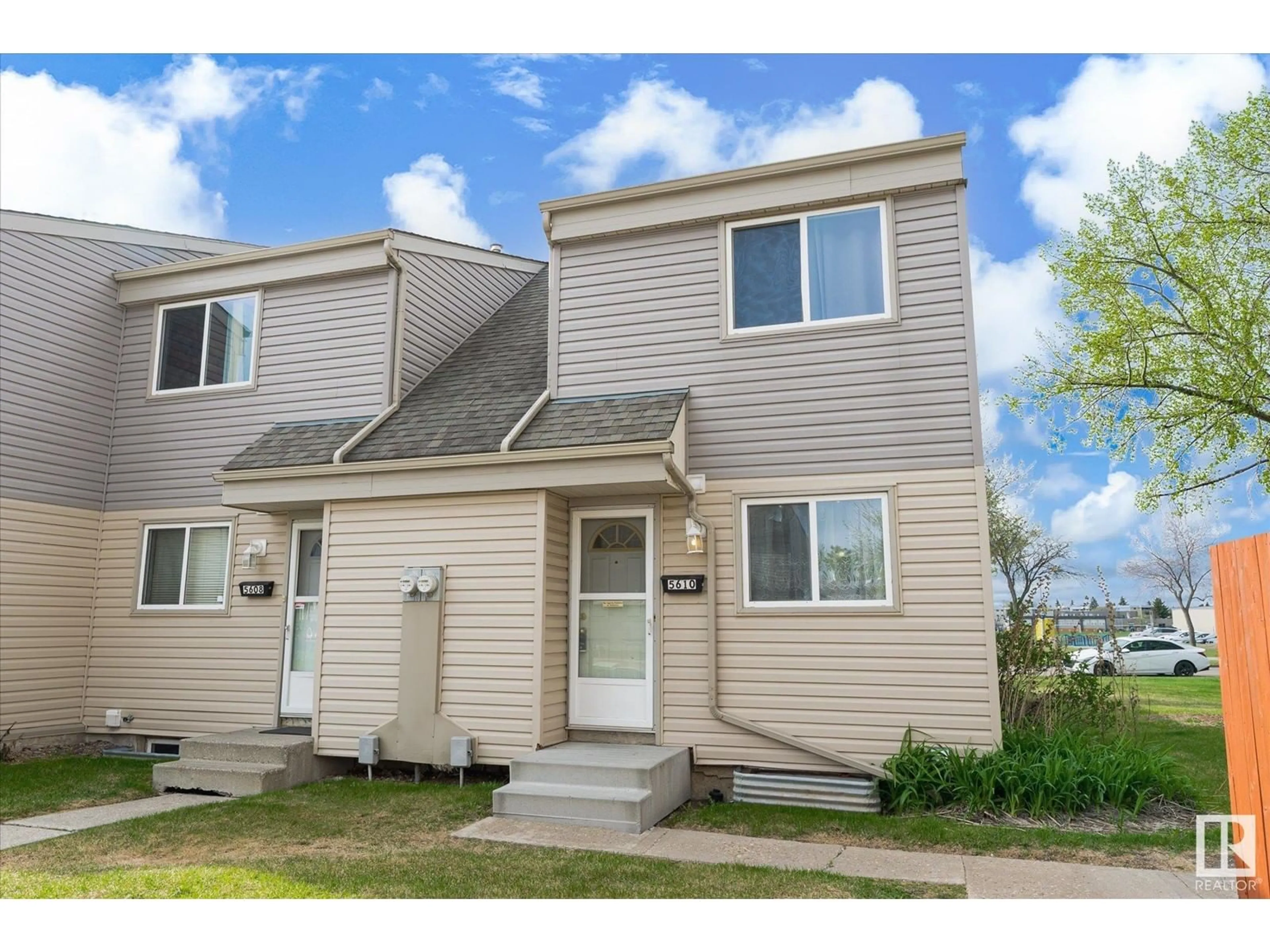 Home with vinyl exterior material, street for 5610 148 ST, Edmonton Alberta T6H4T8