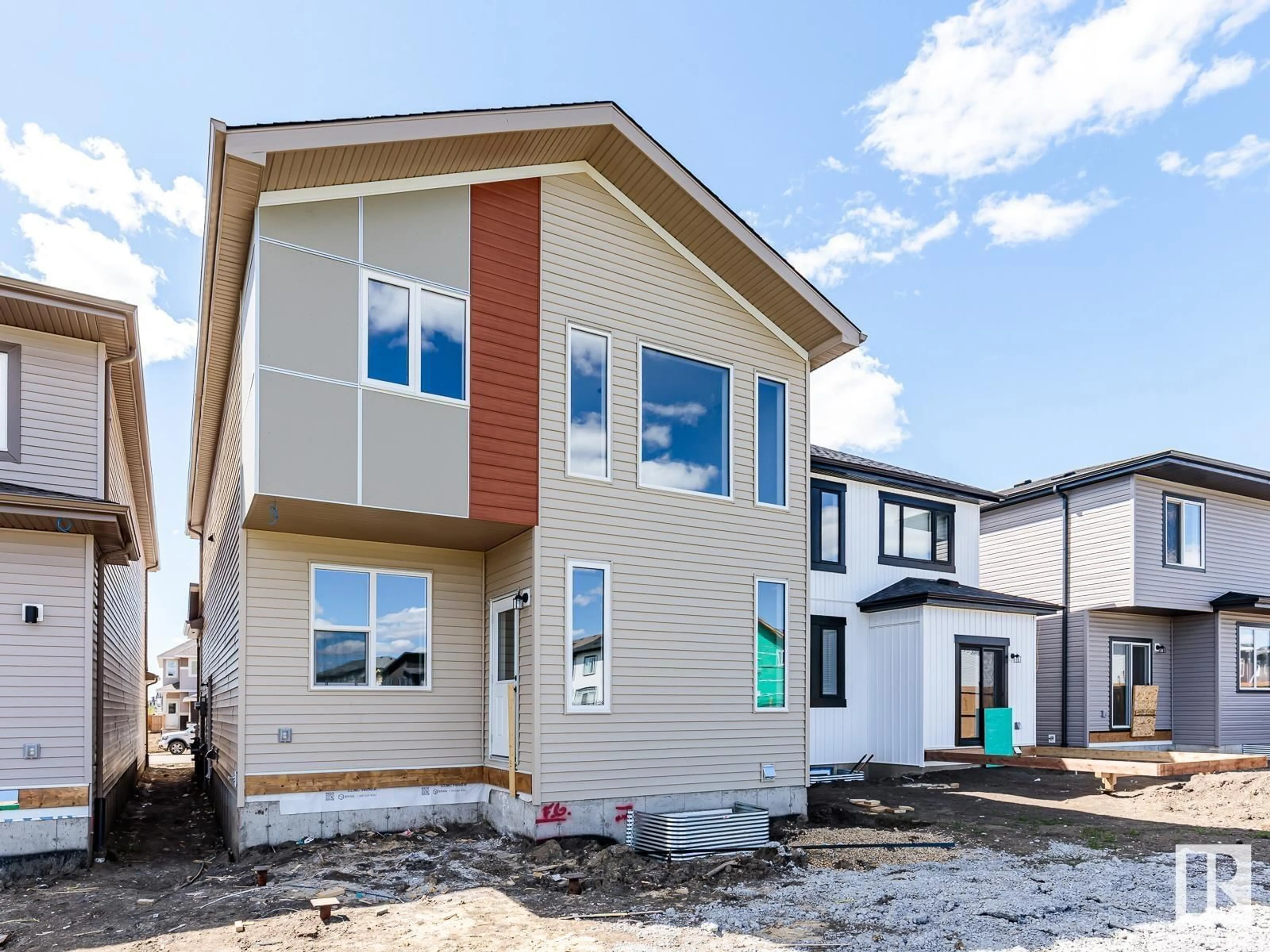 Home with vinyl exterior material, street for SW - 15674 18 AV, Edmonton Alberta T6W5E1