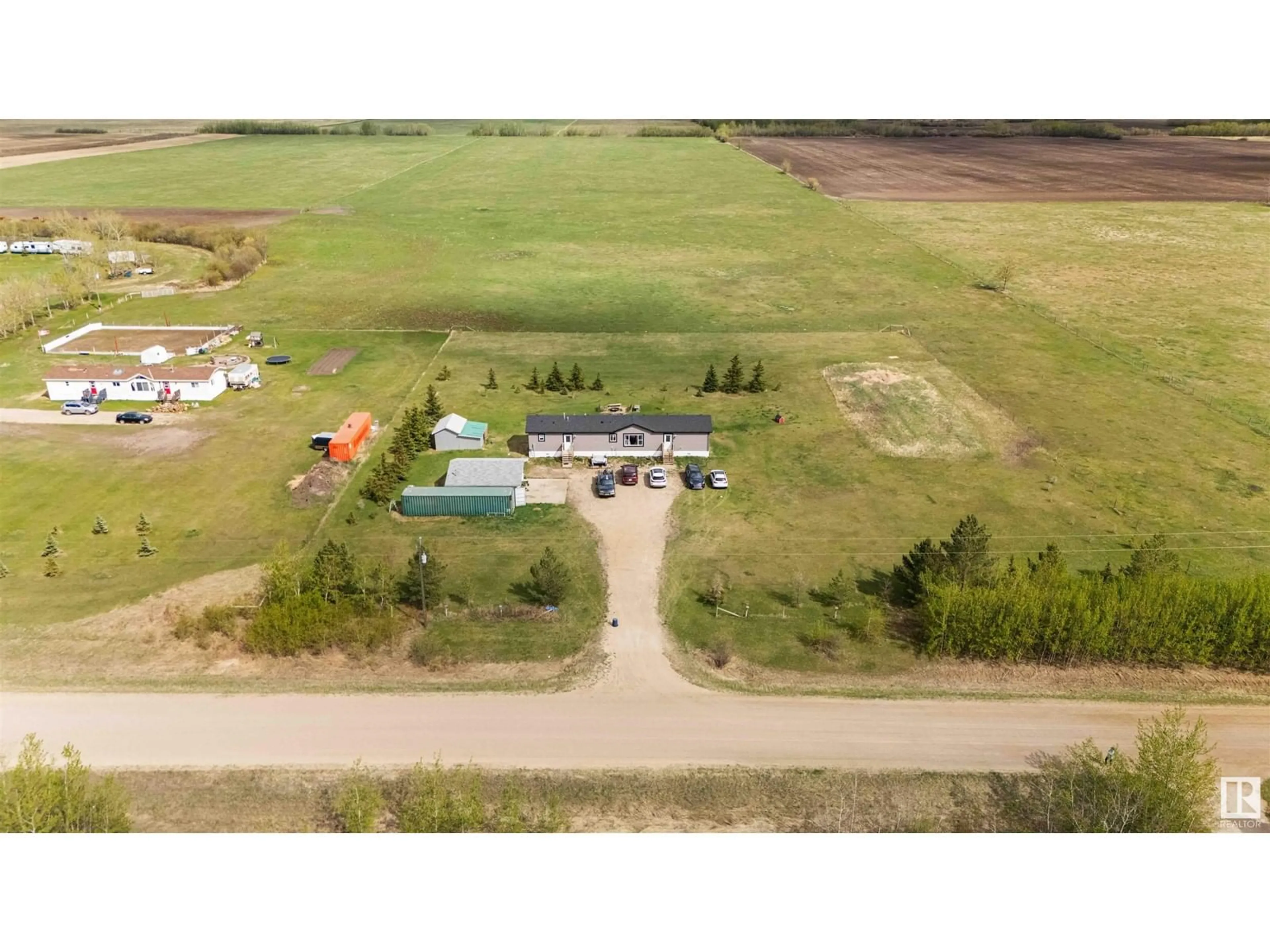 A pic from outside/outdoor area/front of a property/back of a property/a pic from drone, building for 56017 RGE ROAD 261, Rural Sturgeon County Alberta T8R1P4