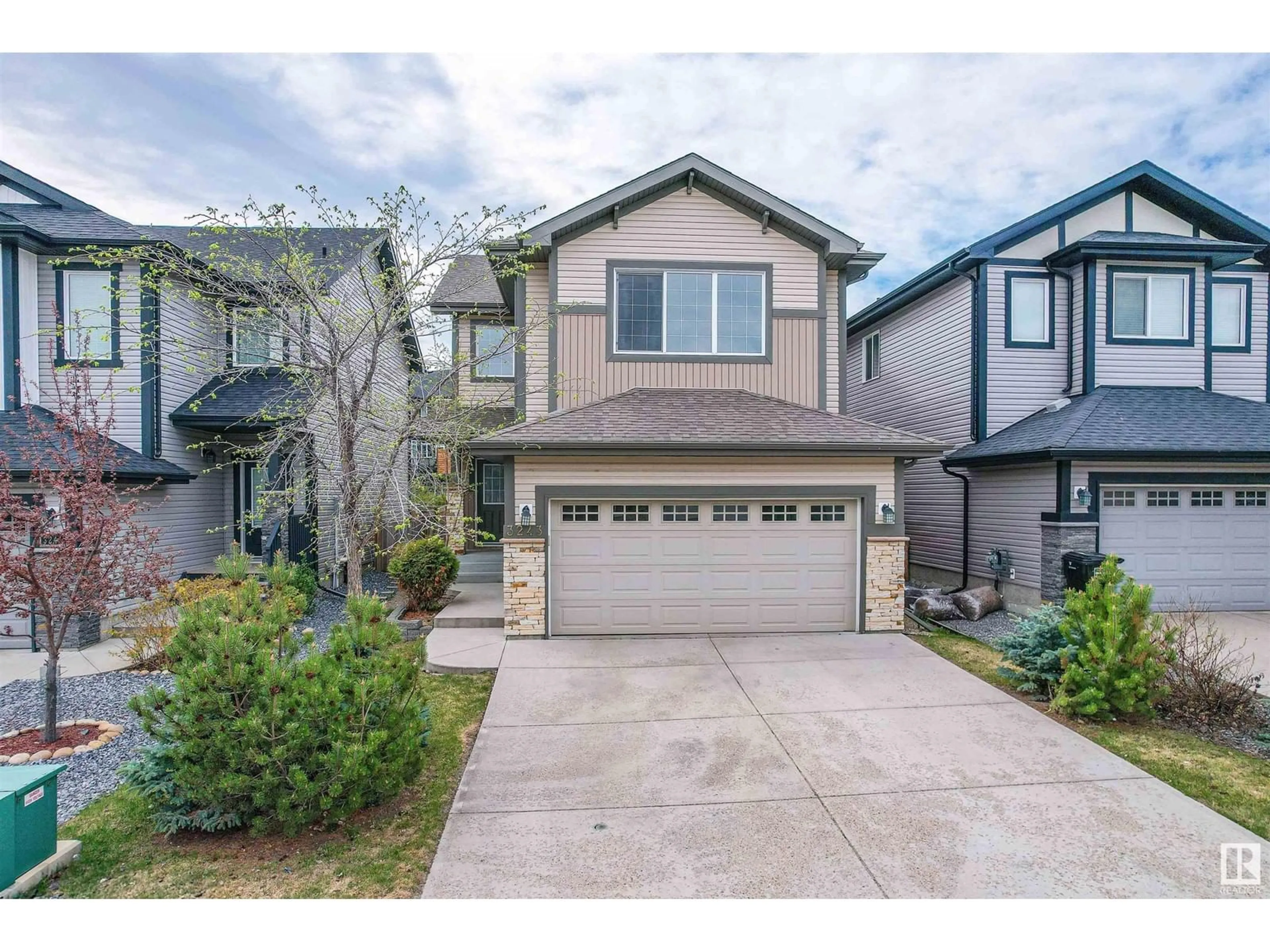 Home with vinyl exterior material, street for 3243 ABBOTT CR, Edmonton Alberta T6W2V3