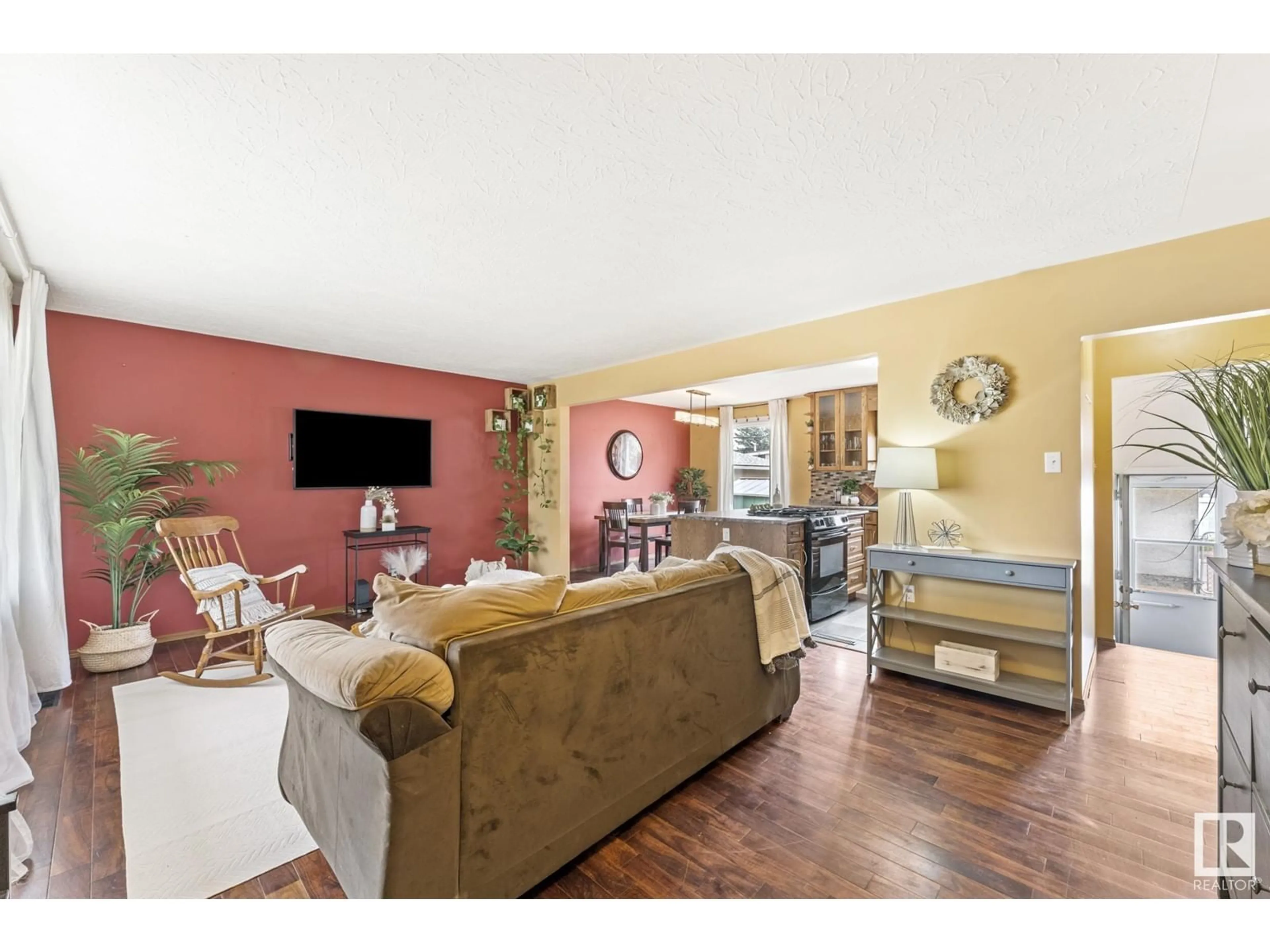 Living room with furniture, wood/laminate floor for NW - 8309 161 ST, Edmonton Alberta T5R2K7