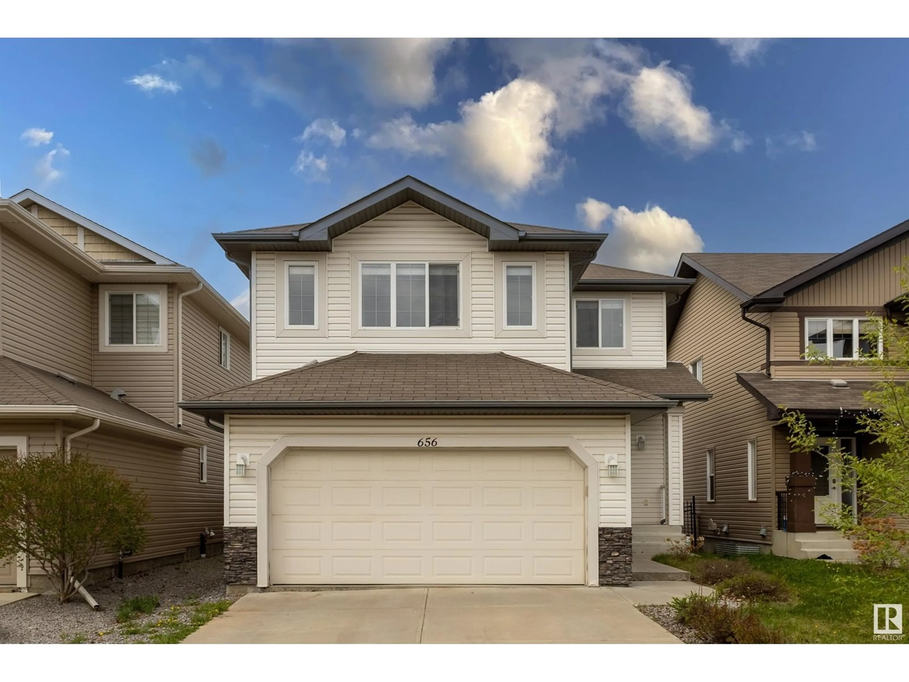 Home with vinyl exterior material, street for SW - 656 171 ST, Edmonton Alberta T6W0M1