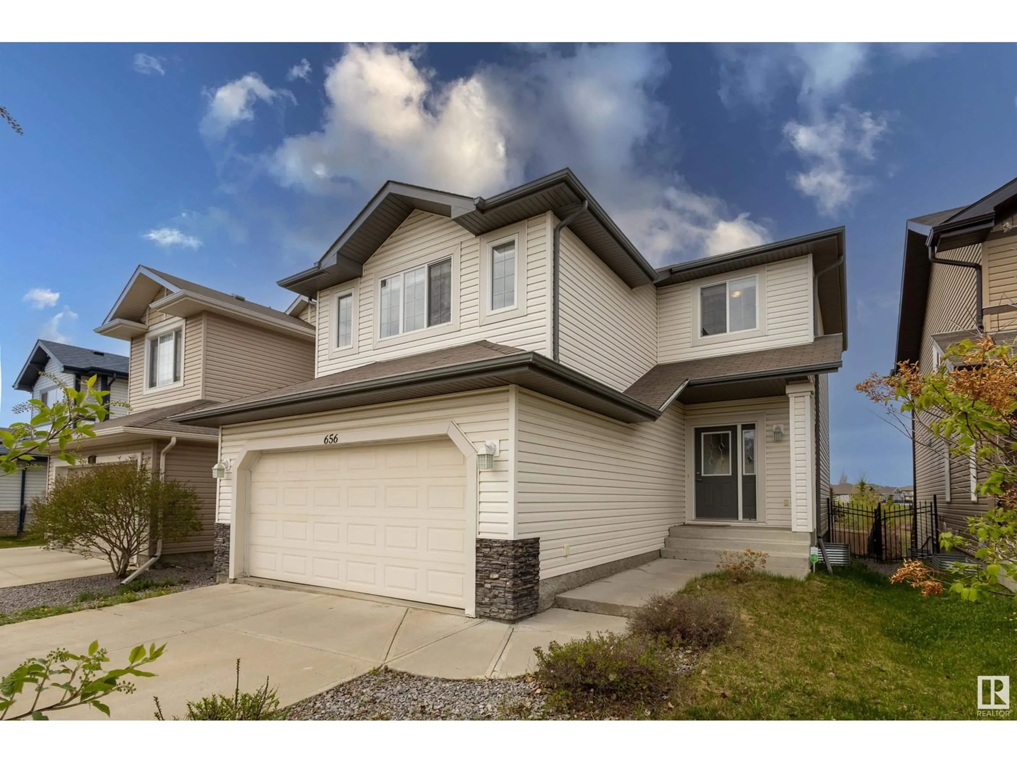 Home with vinyl exterior material, street for SW - 656 171 ST, Edmonton Alberta T6W0M1