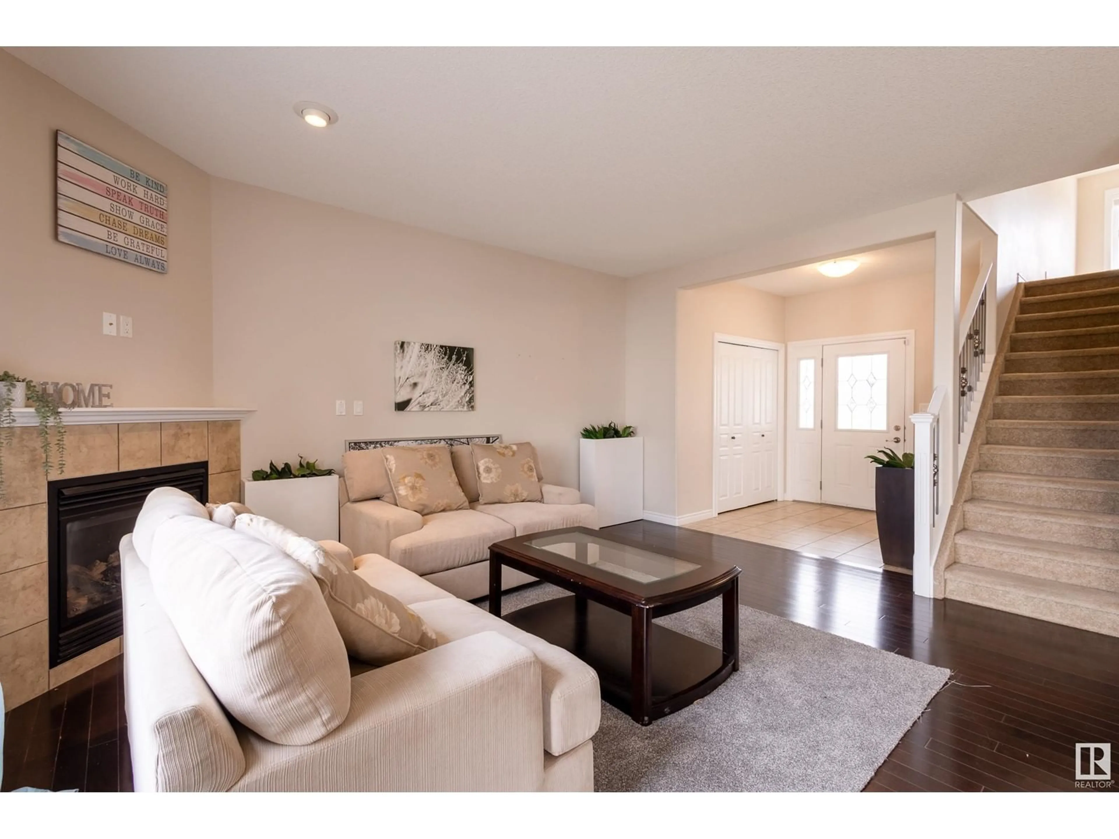 Living room with furniture, wood/laminate floor for SW - 656 171 ST, Edmonton Alberta T6W0M1