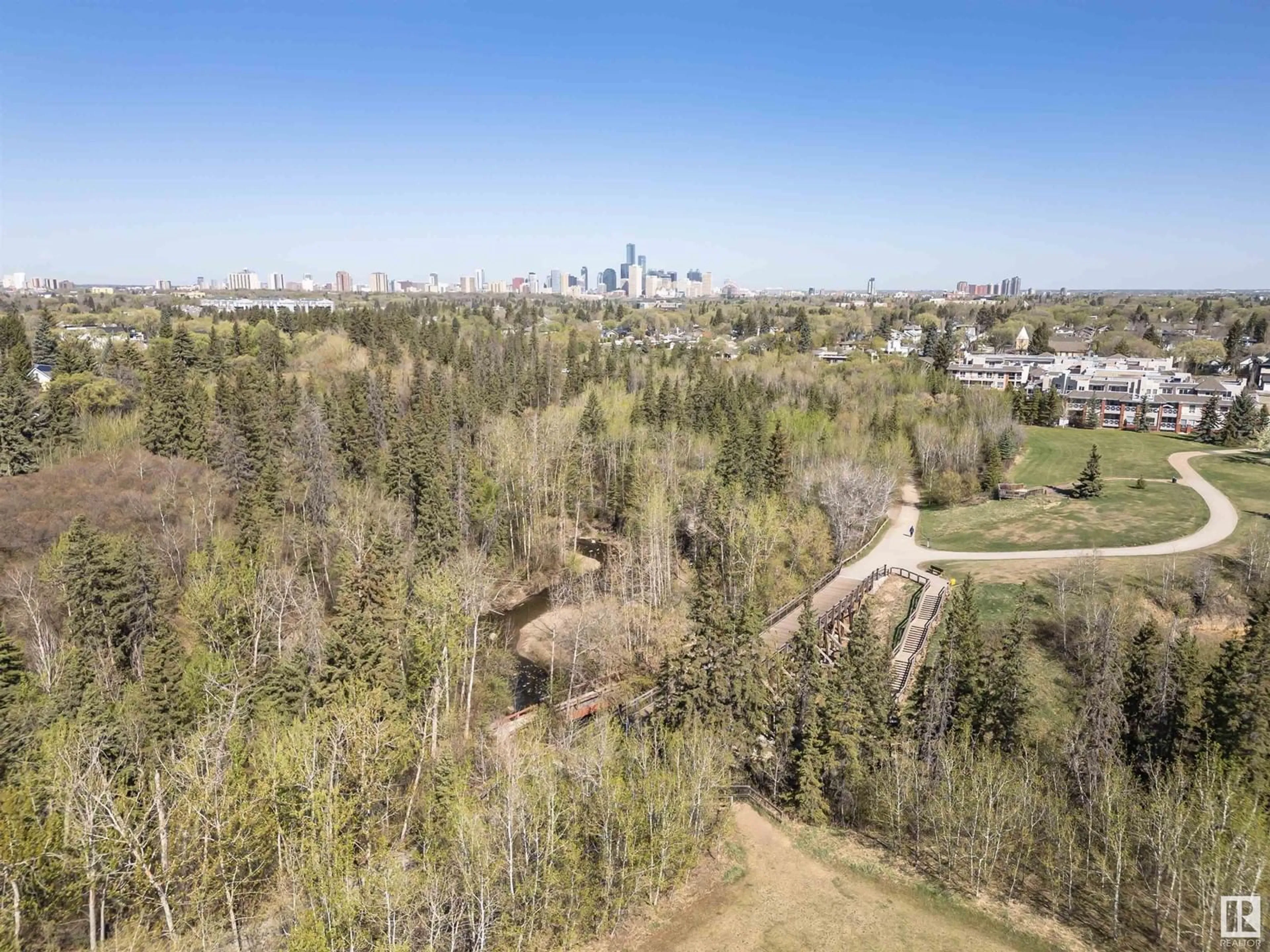 A pic from outside/outdoor area/front of a property/back of a property/a pic from drone, forest/trees view for 9146 73 AV, Edmonton Alberta T5H1B5
