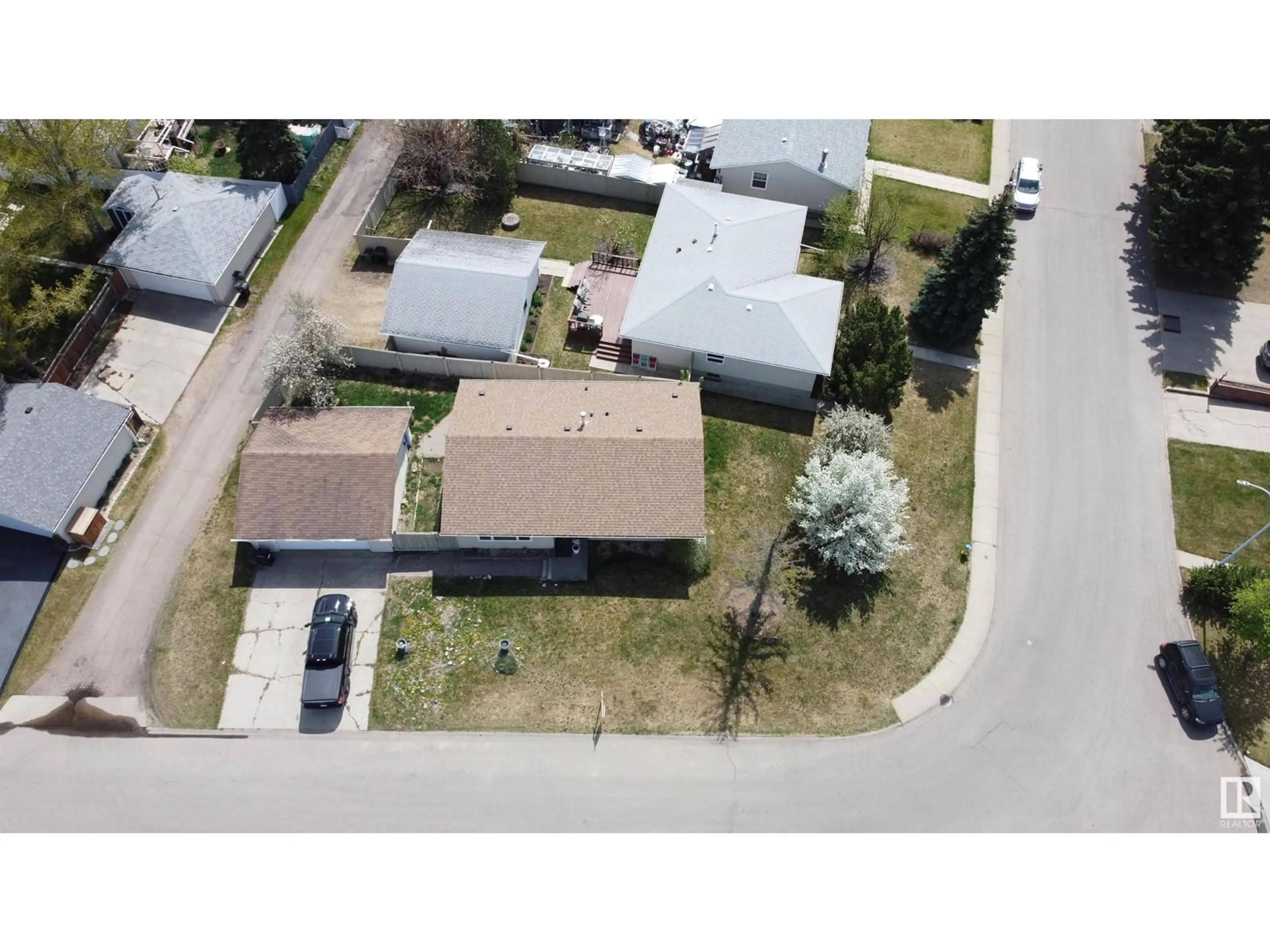 A pic from outside/outdoor area/front of a property/back of a property/a pic from drone, street for 8107 22 AV, Edmonton Alberta T6X1Z2