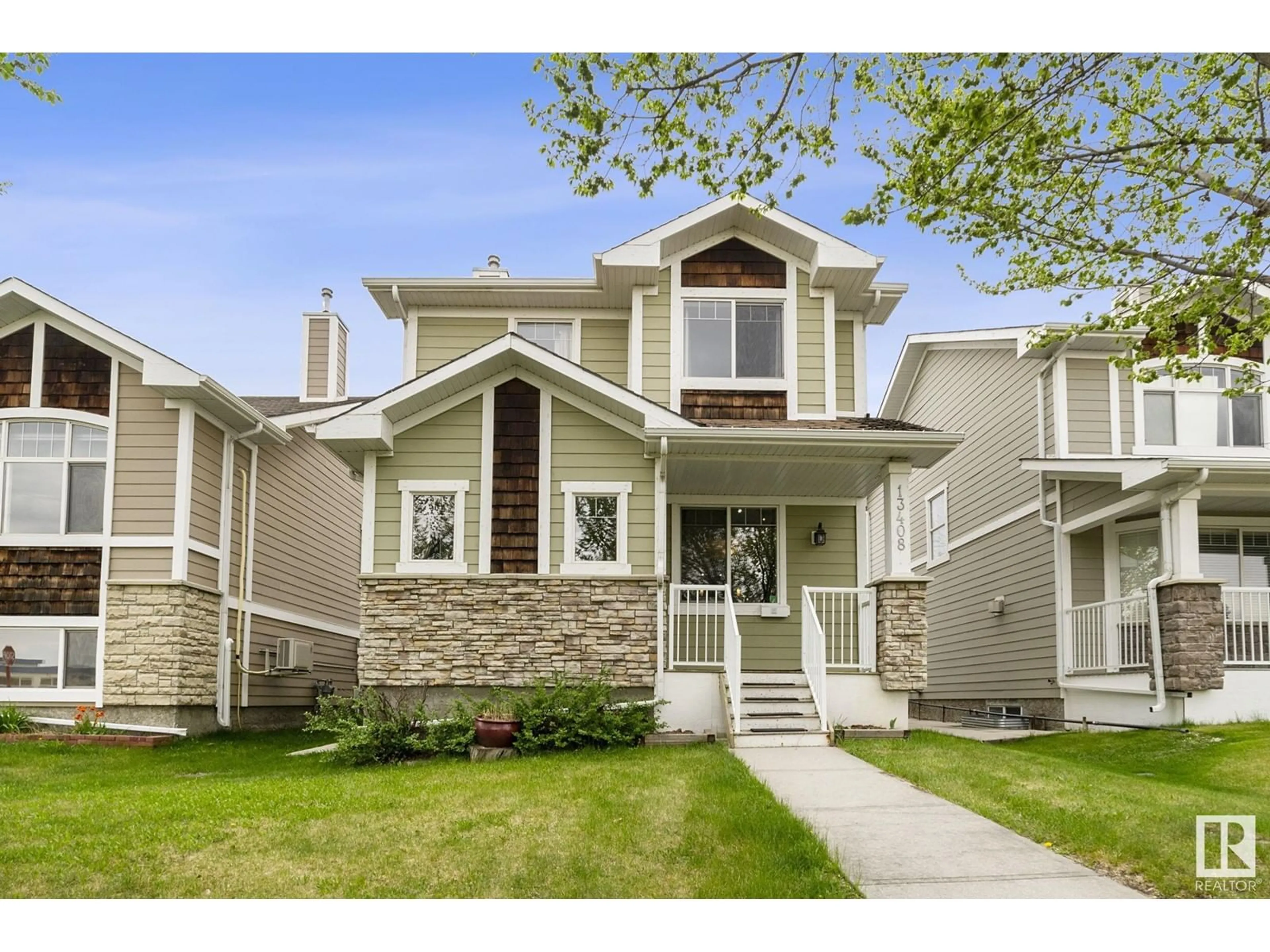 Home with vinyl exterior material, street for 13408 62ST NW, Edmonton Alberta T5A0V7