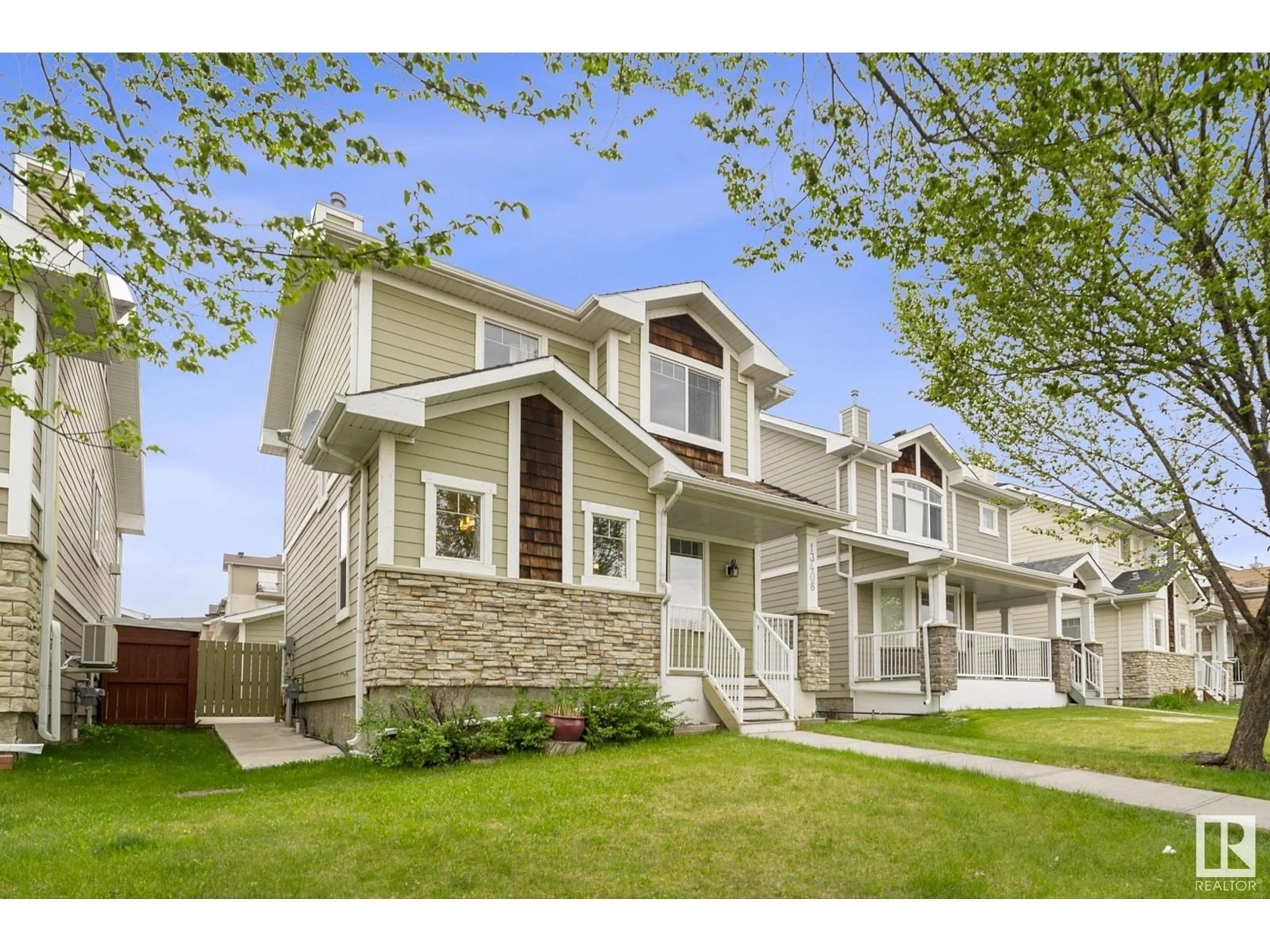 Home with vinyl exterior material, street for 13408 62ST NW, Edmonton Alberta T5A0V7