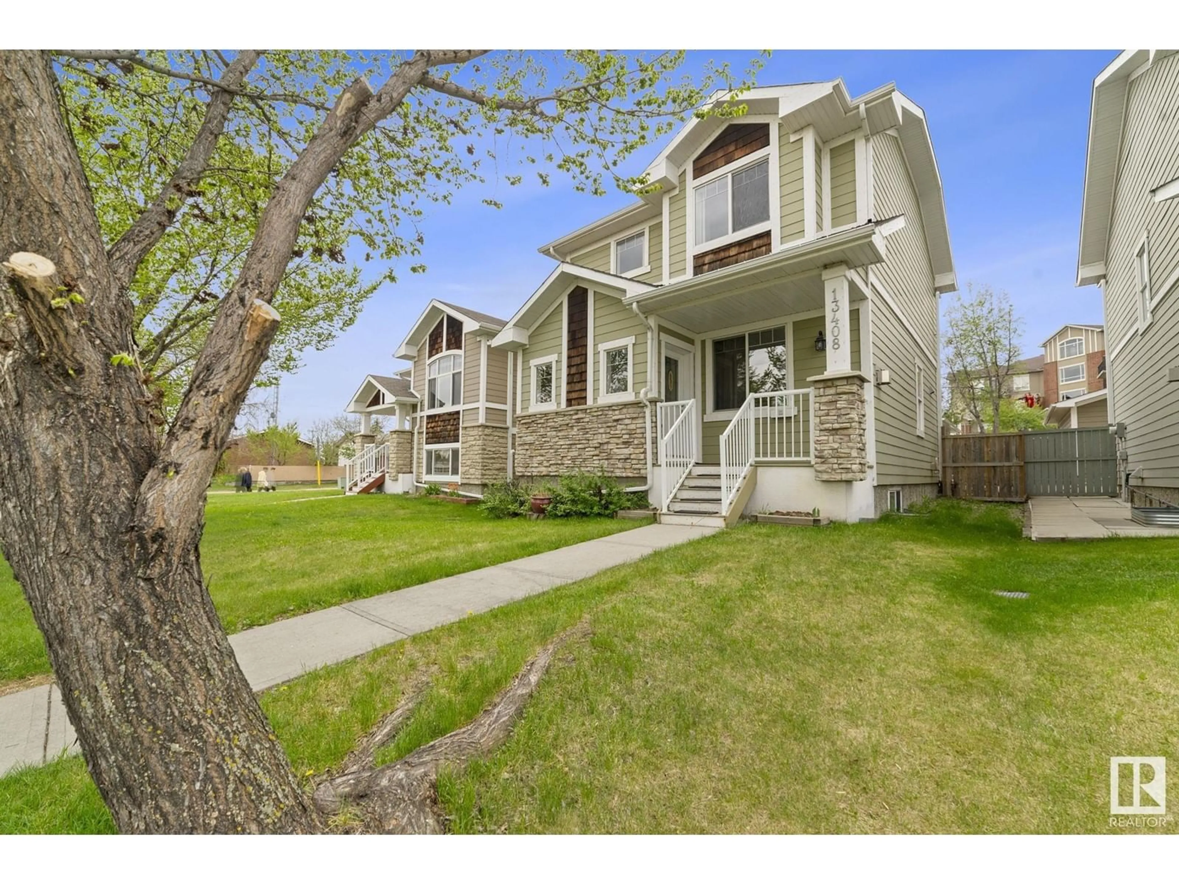 Home with vinyl exterior material, street for 13408 62ST NW, Edmonton Alberta T5A0V7
