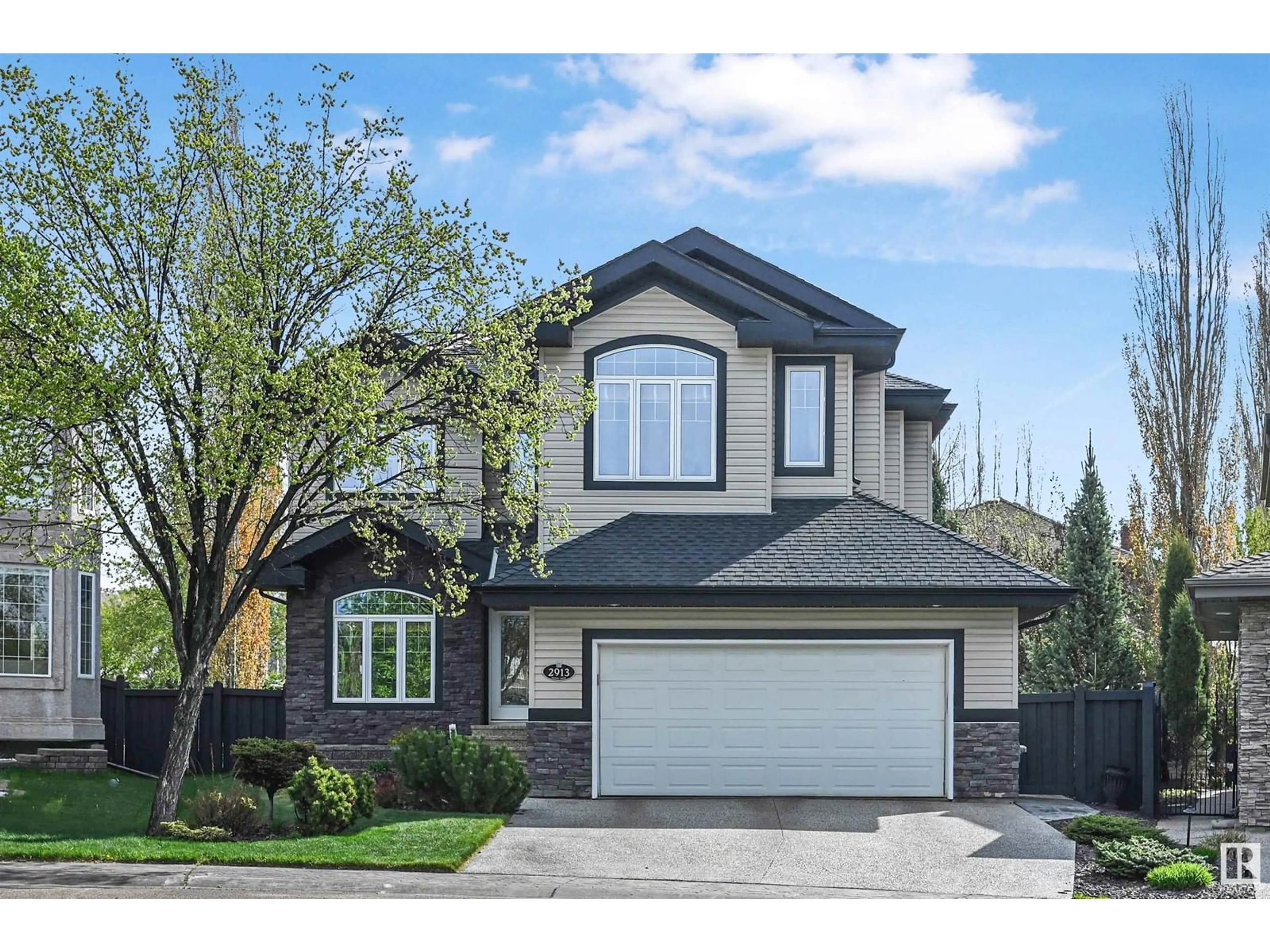 Home with vinyl exterior material, street for 2913 TREDGER GR, Edmonton Alberta T6R3R7